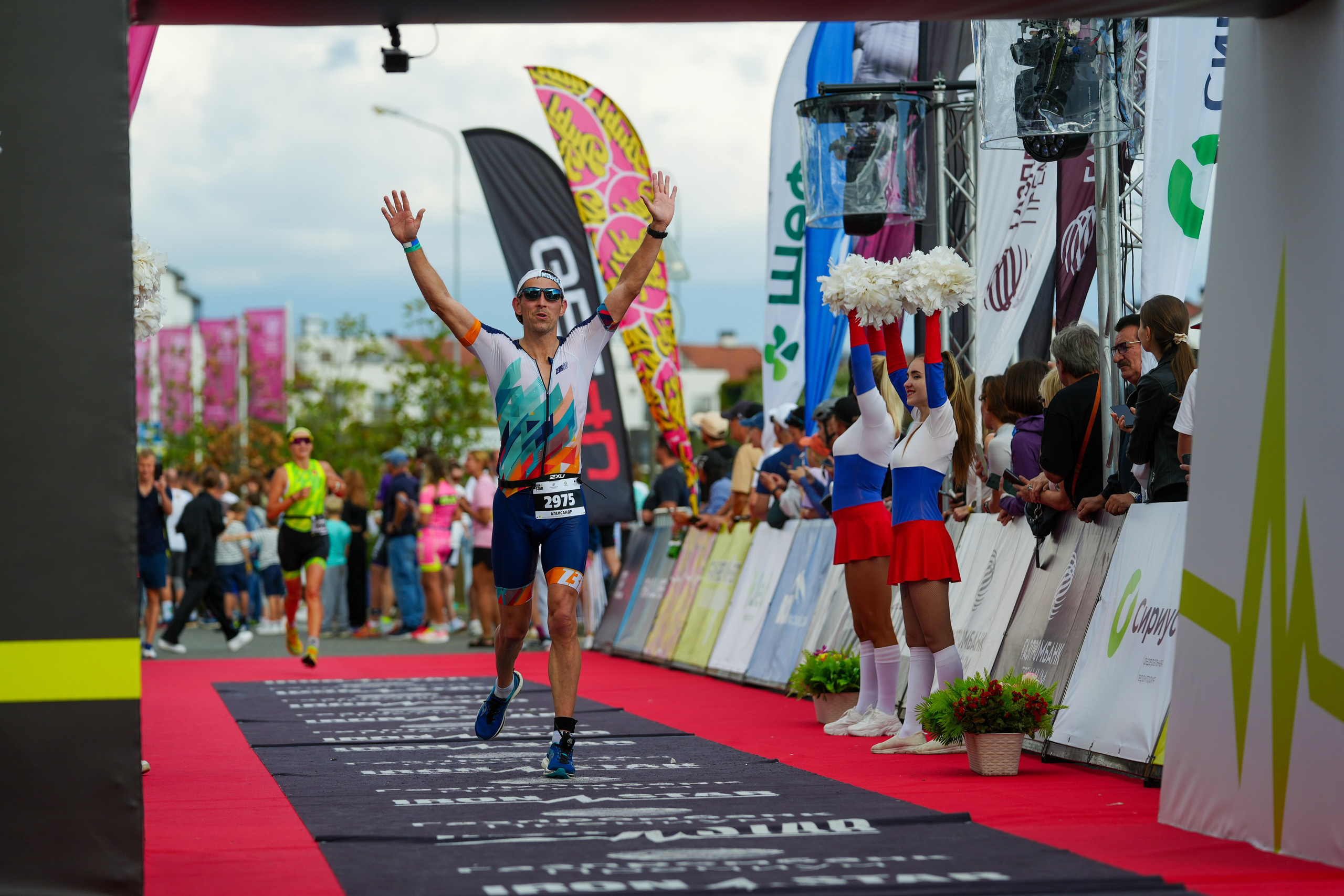 Фотоотчет партнерской интеграции для компании TELE2 на фестивале Ironstar. Репортажный фотограф в Красной Поляне и Сочи Павлюченко Екатерина