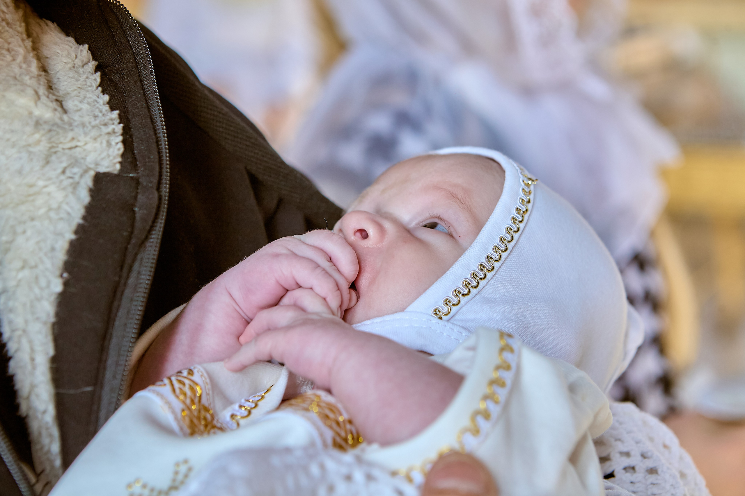 Момент и взгляд младенца Православный фотограф Николай Голованов