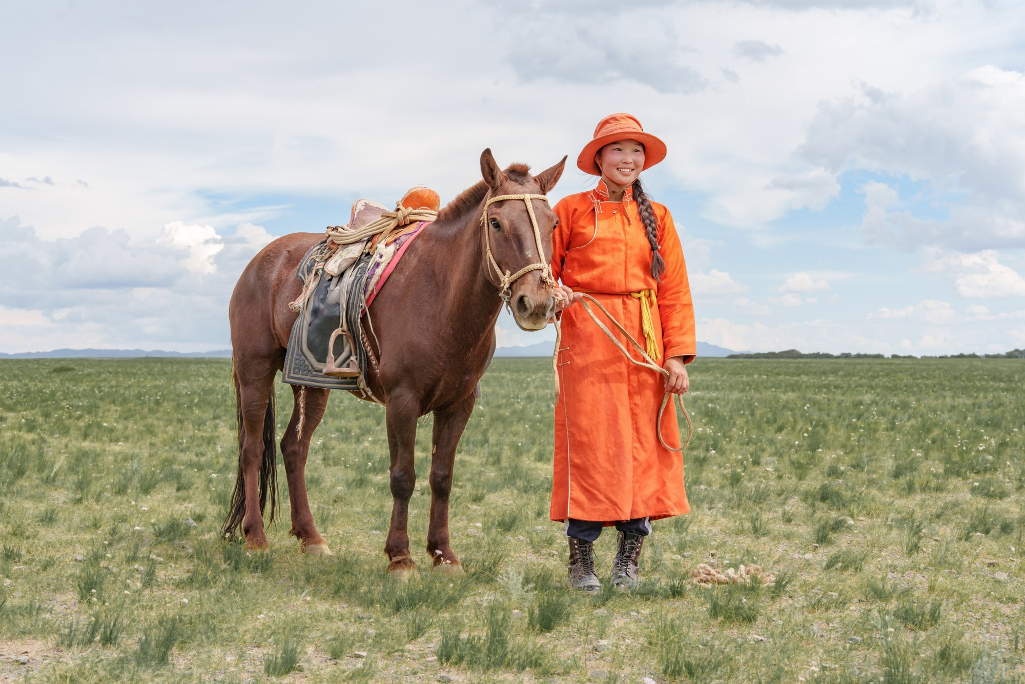 A nomad helps in the traditional foal taming in Mongolia
