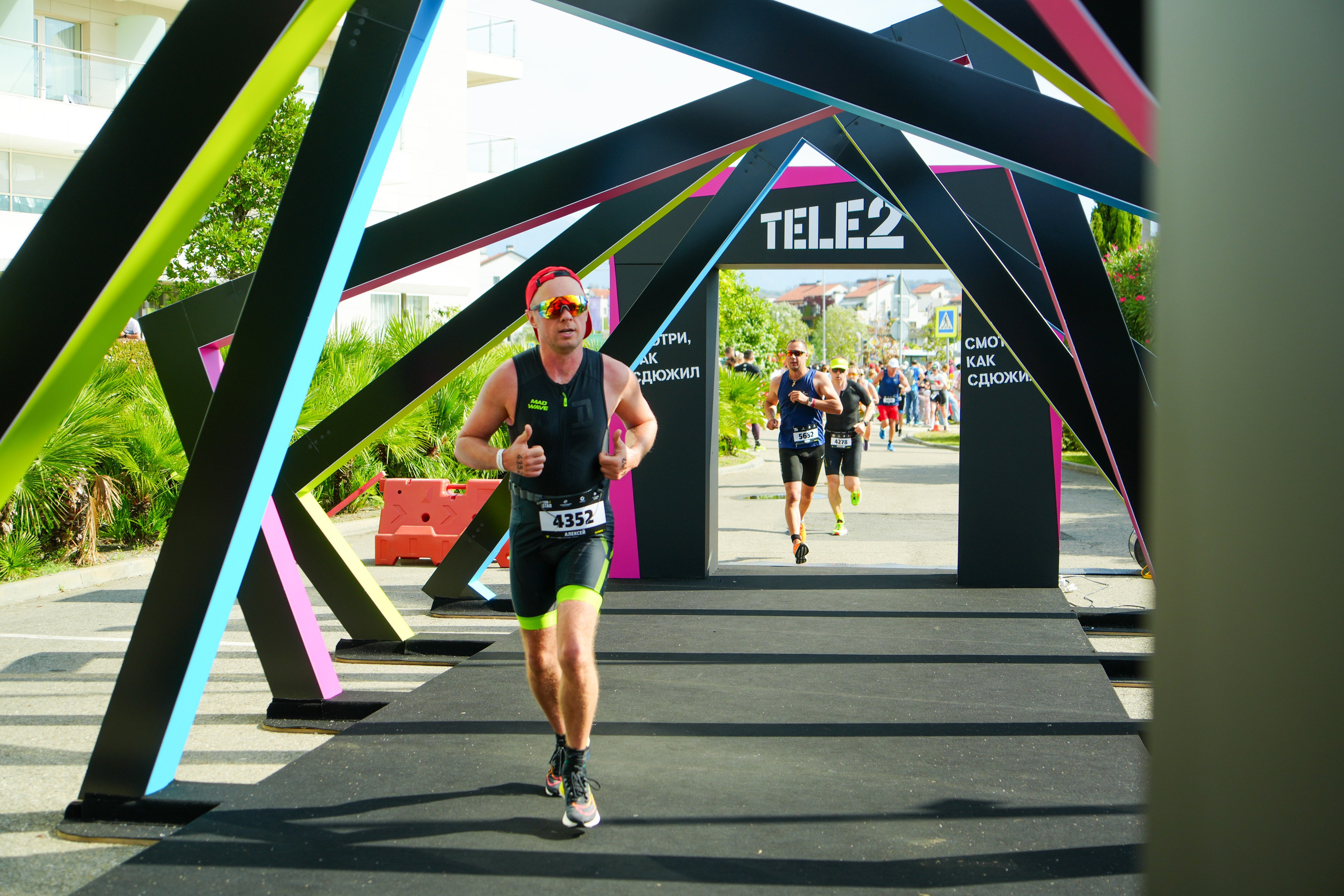 Фотоотчет партнерской интеграции для компании TELE2 на фестивале Ironstar. Репортажный фотограф в Красной Поляне и Сочи Павлюченко Екатерина