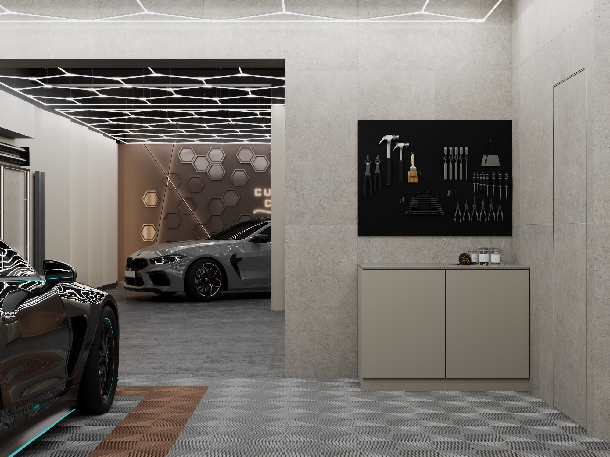 Рабочая зона детейлинг-студии с инструментами на магнитной панели и шкафом для хранения