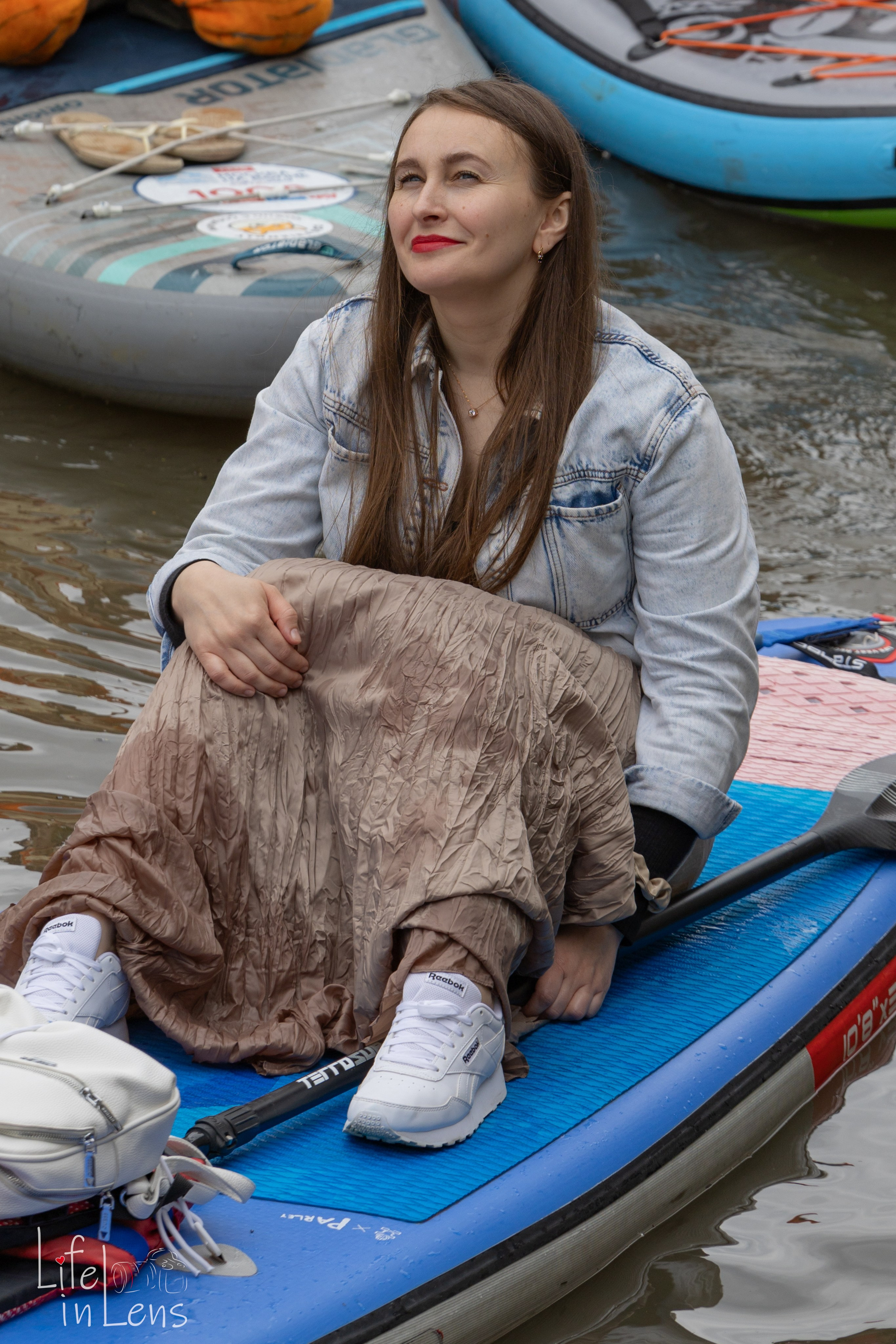 SUP-карнавал. Фотограф, получающий удовольствие от своей работы