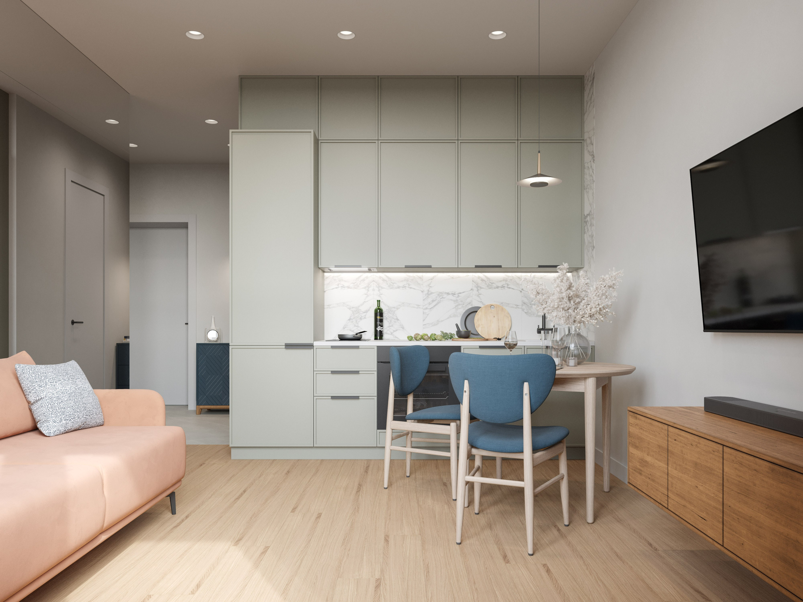 Минималистичная кухня с пастельными зелеными фасадами и гостиной с деревянной акцентной тумбой