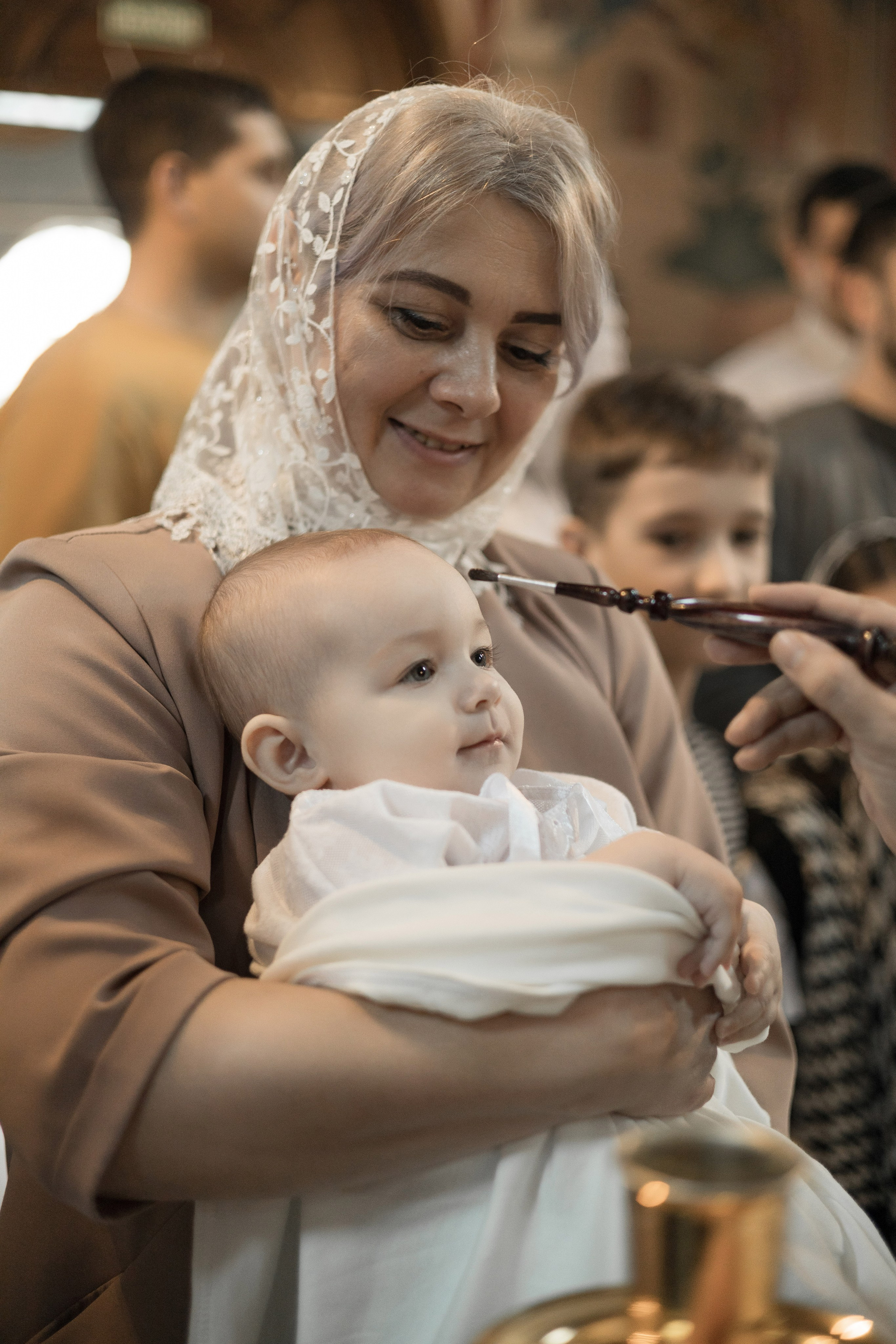 Крещение Миланы в церкви иконы Божией Матери / пасмурная погода. Анастасия Безуглова- свадебный фотограф в Таганроге