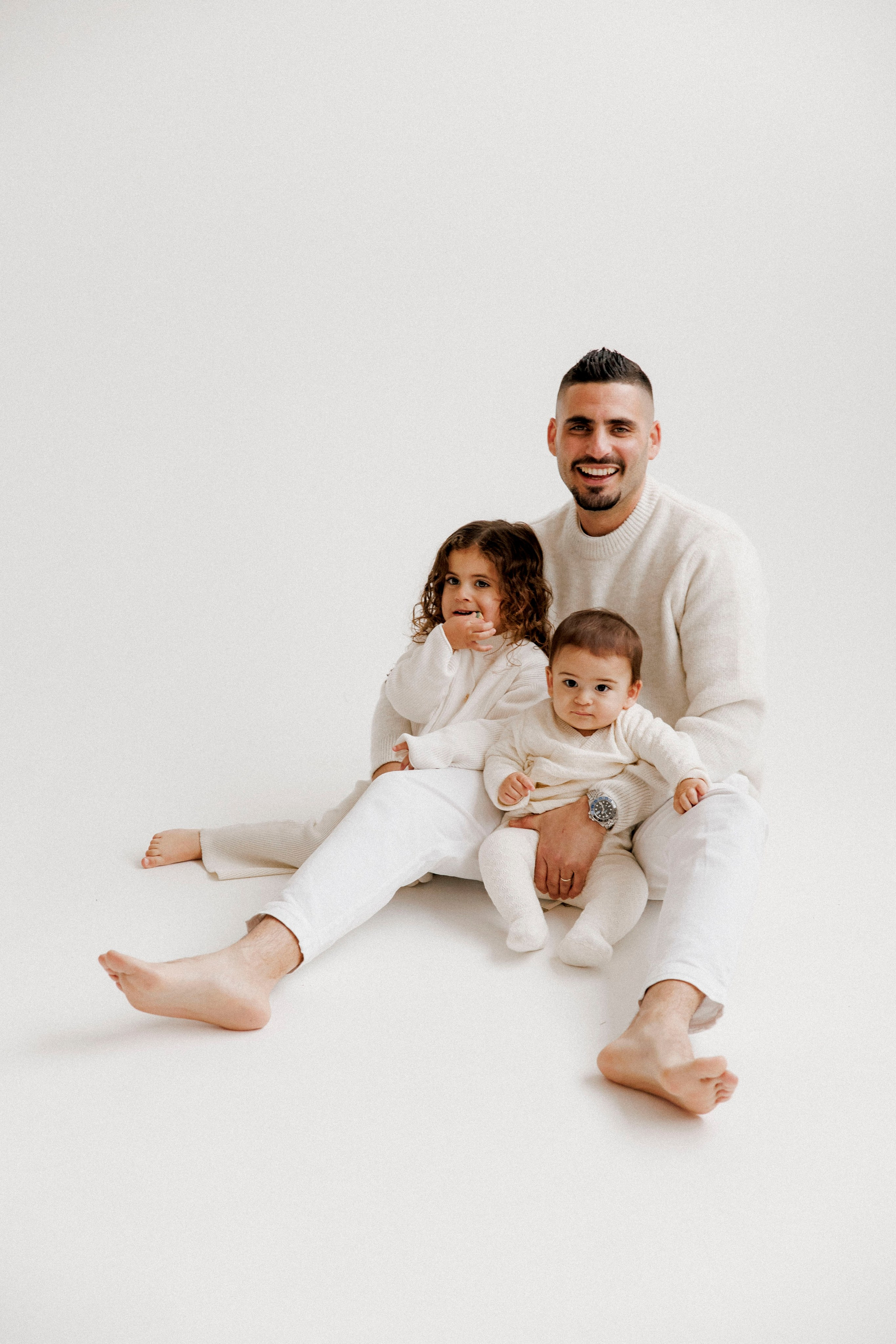 Family photoshoot in White Studio. Wedding and family photographer