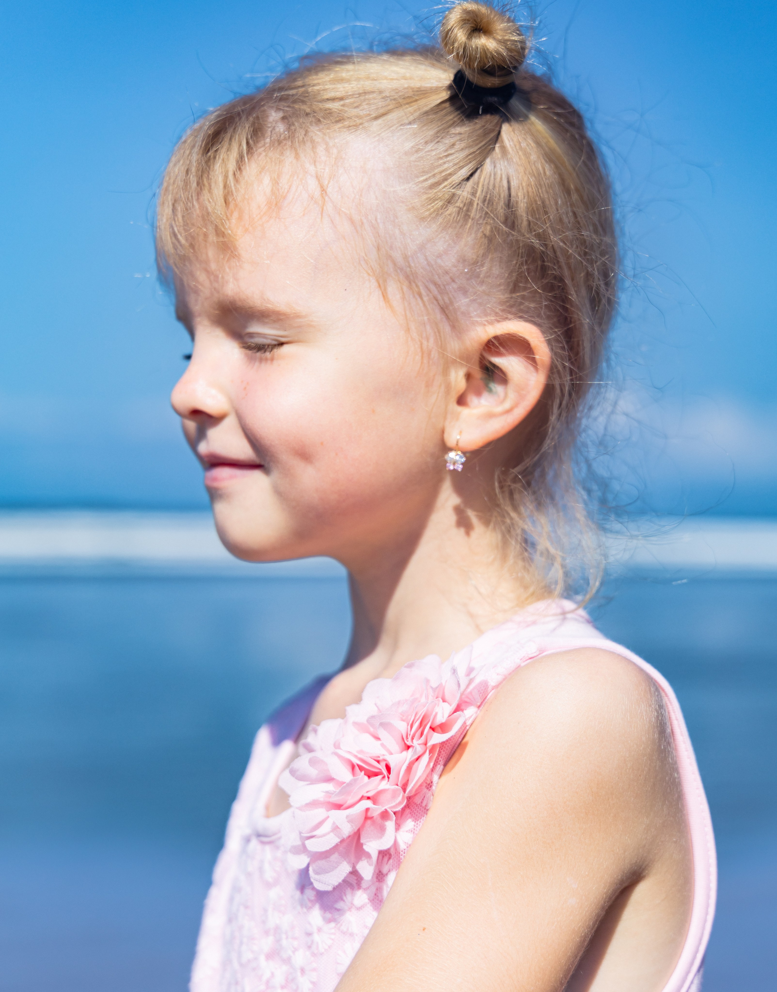 Children's portraits on the ocean