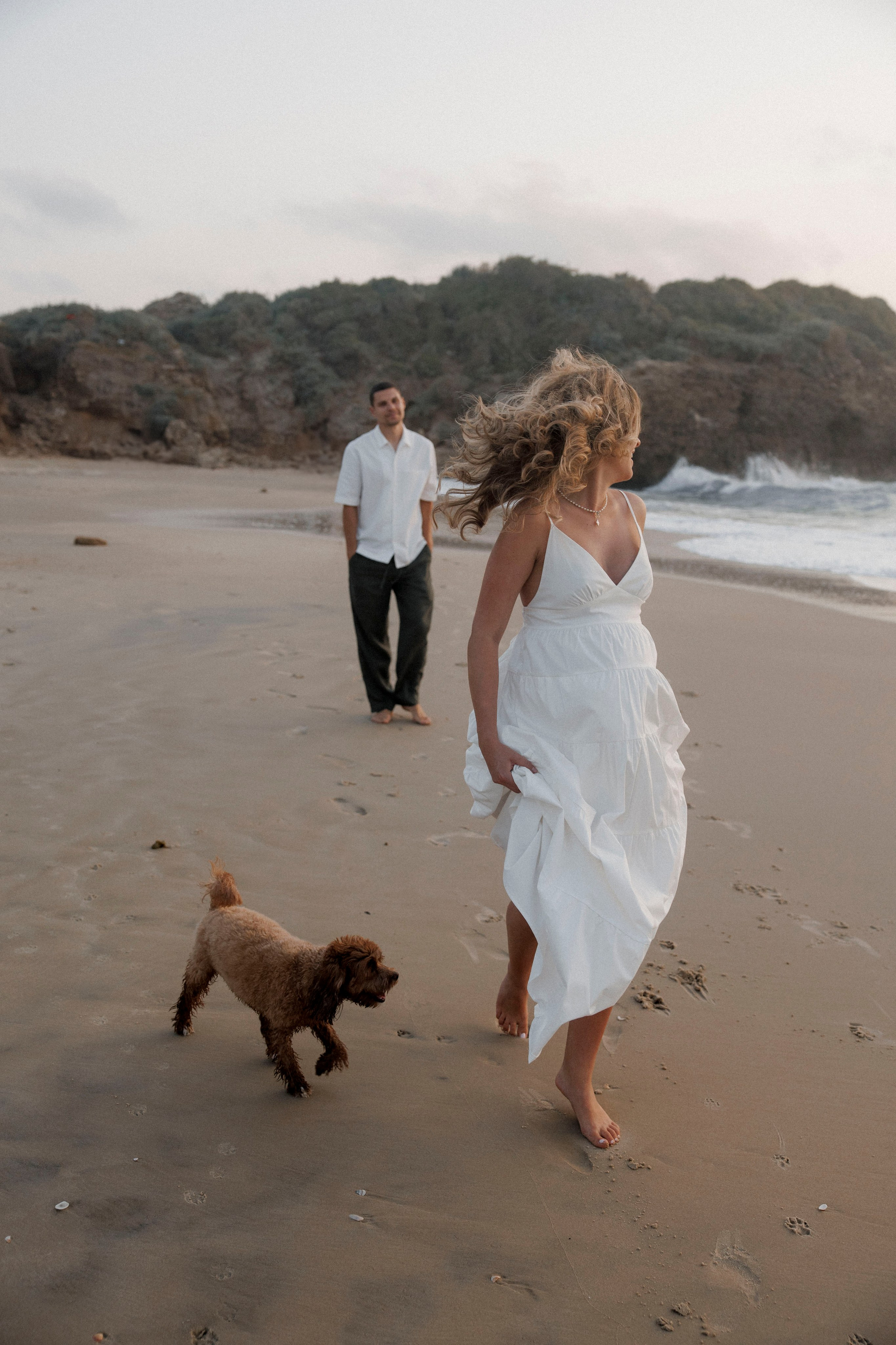 Pregnancy photoshoot near the sea (cloudy weather). Главная
