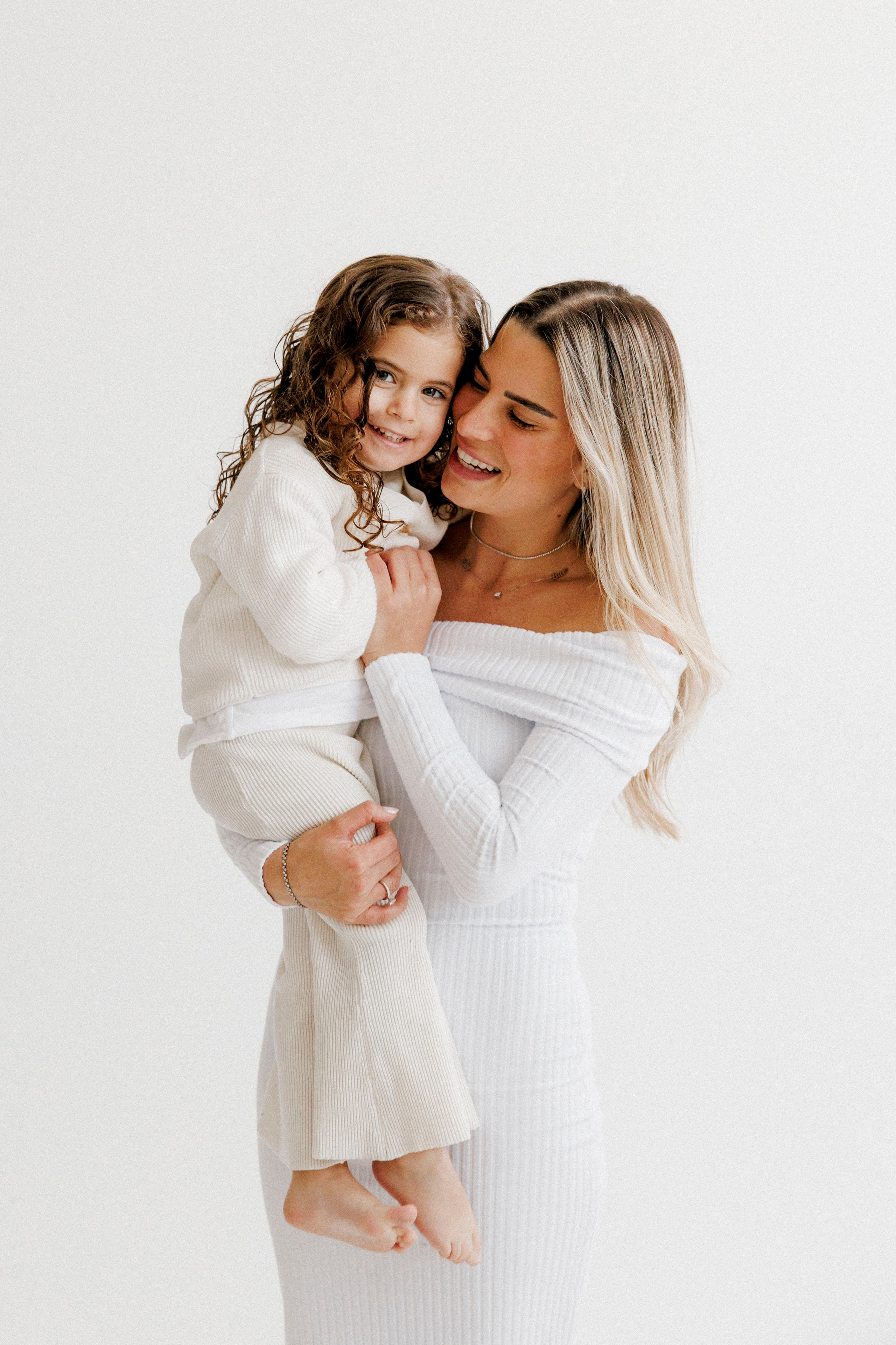 Family photoshoot in White Studio. Wedding and family photographer