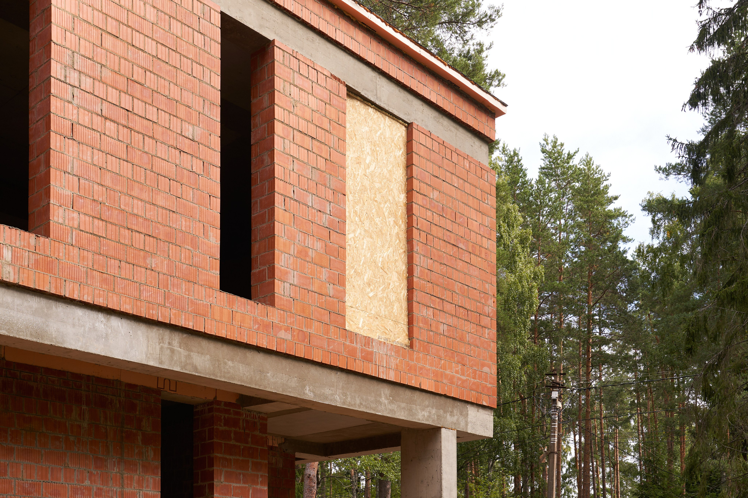 Фотосъёмка строительства дома в Комарово — архитектурный проект на стадии кирпичных работ. Сергей Горшенин — профессиональный фотограф