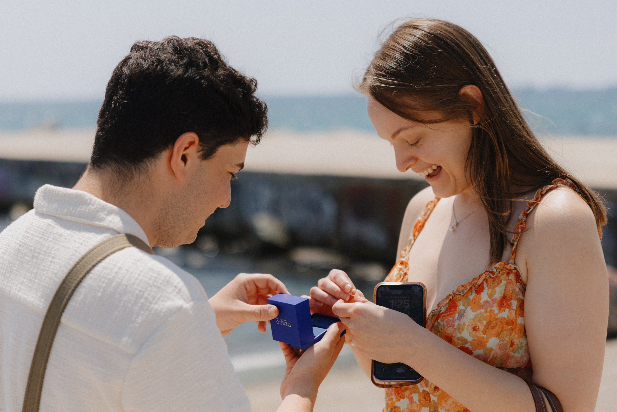 Romantic marriage proposal during golden hour in Barcelona