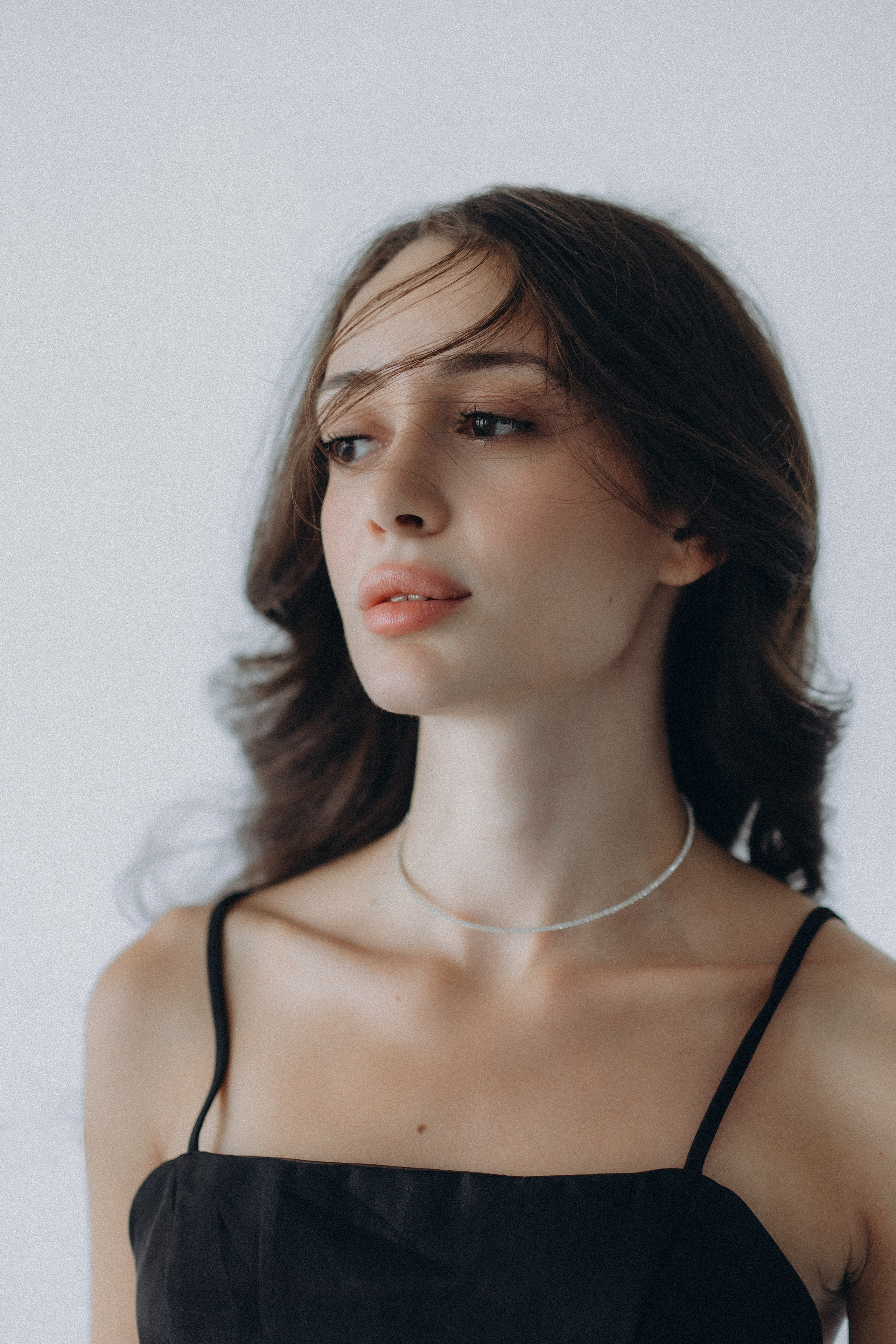 Woman’s portrait with soft light and shadows