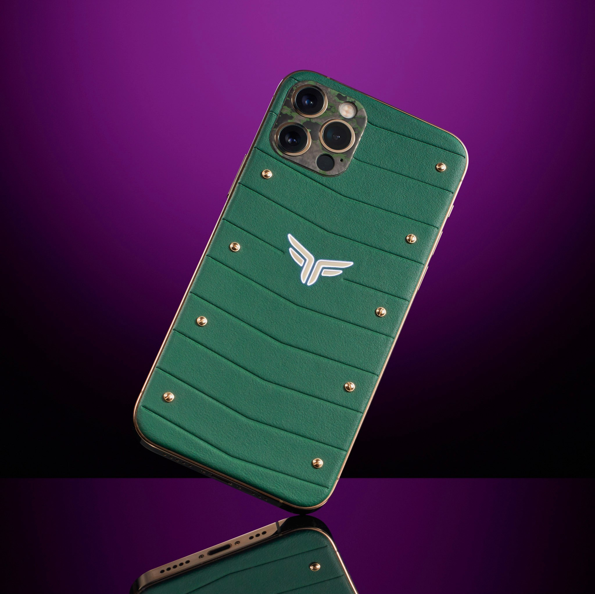 Felix Ferro custom iPhone with glowing FF logo on purple background - photographer Andrey Dunin