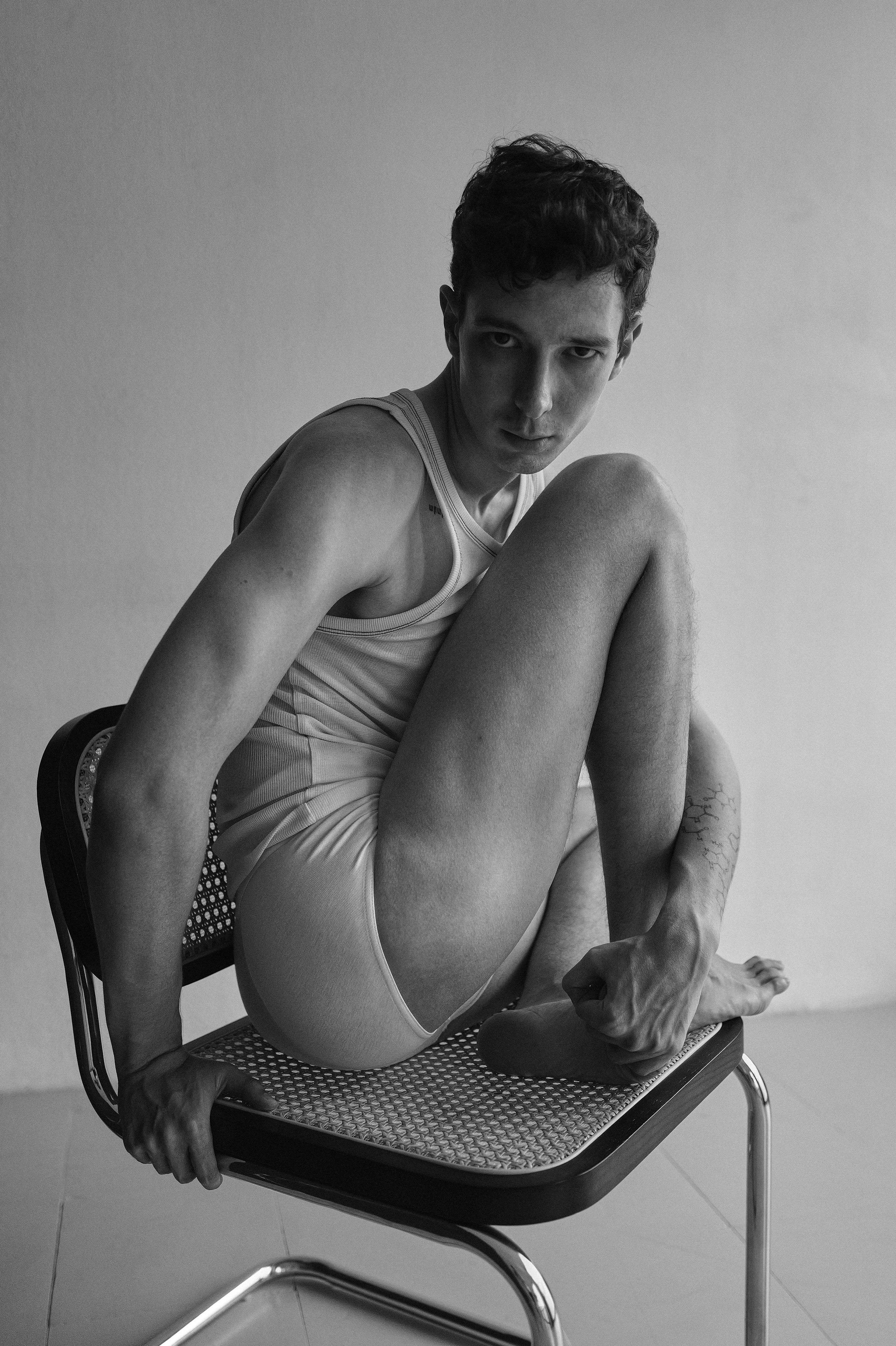 Barcelona artistic male portrait combining strength and flexibility in studio