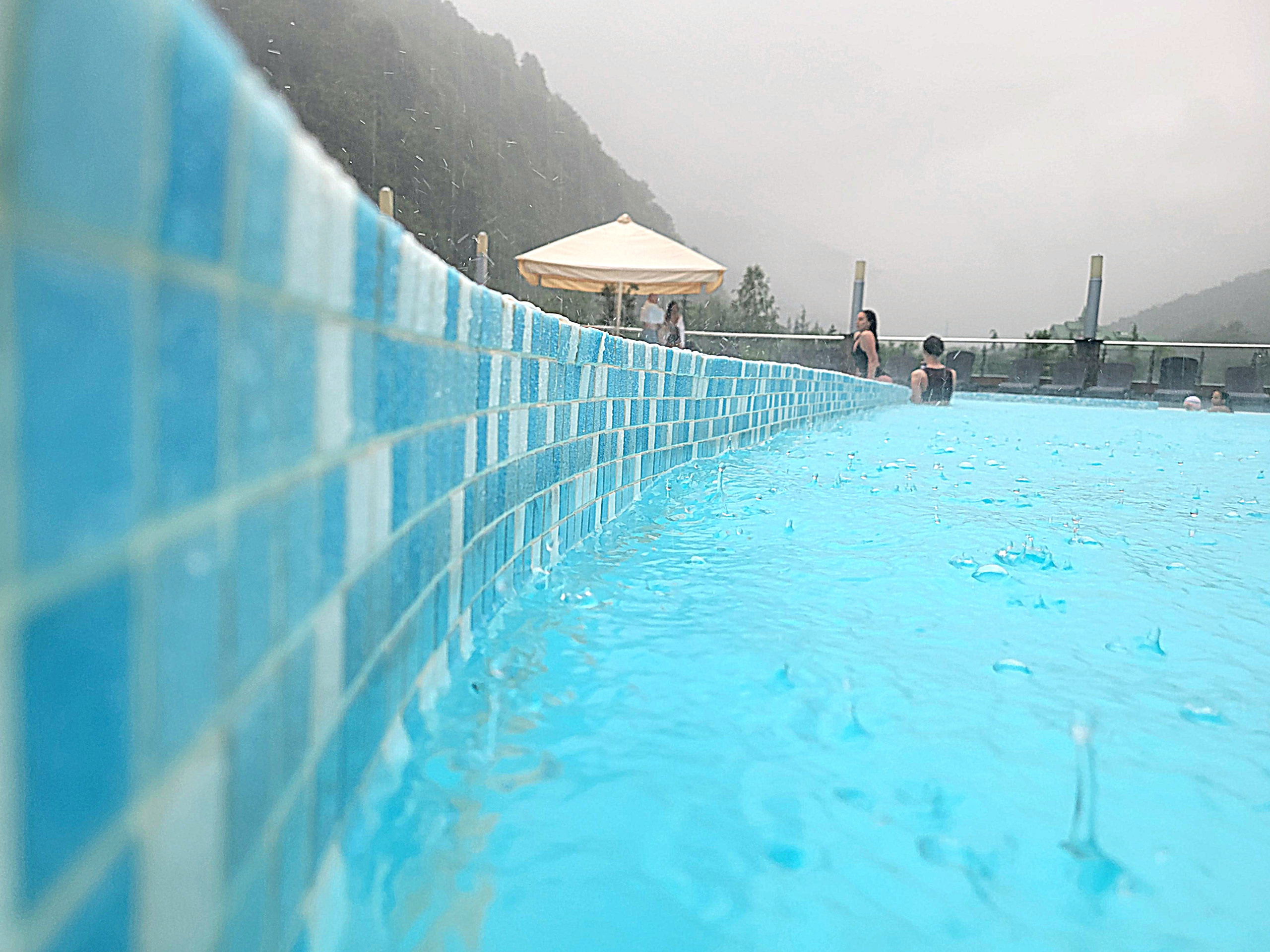 Swim under the rain - beautiful experience after long way in mountains