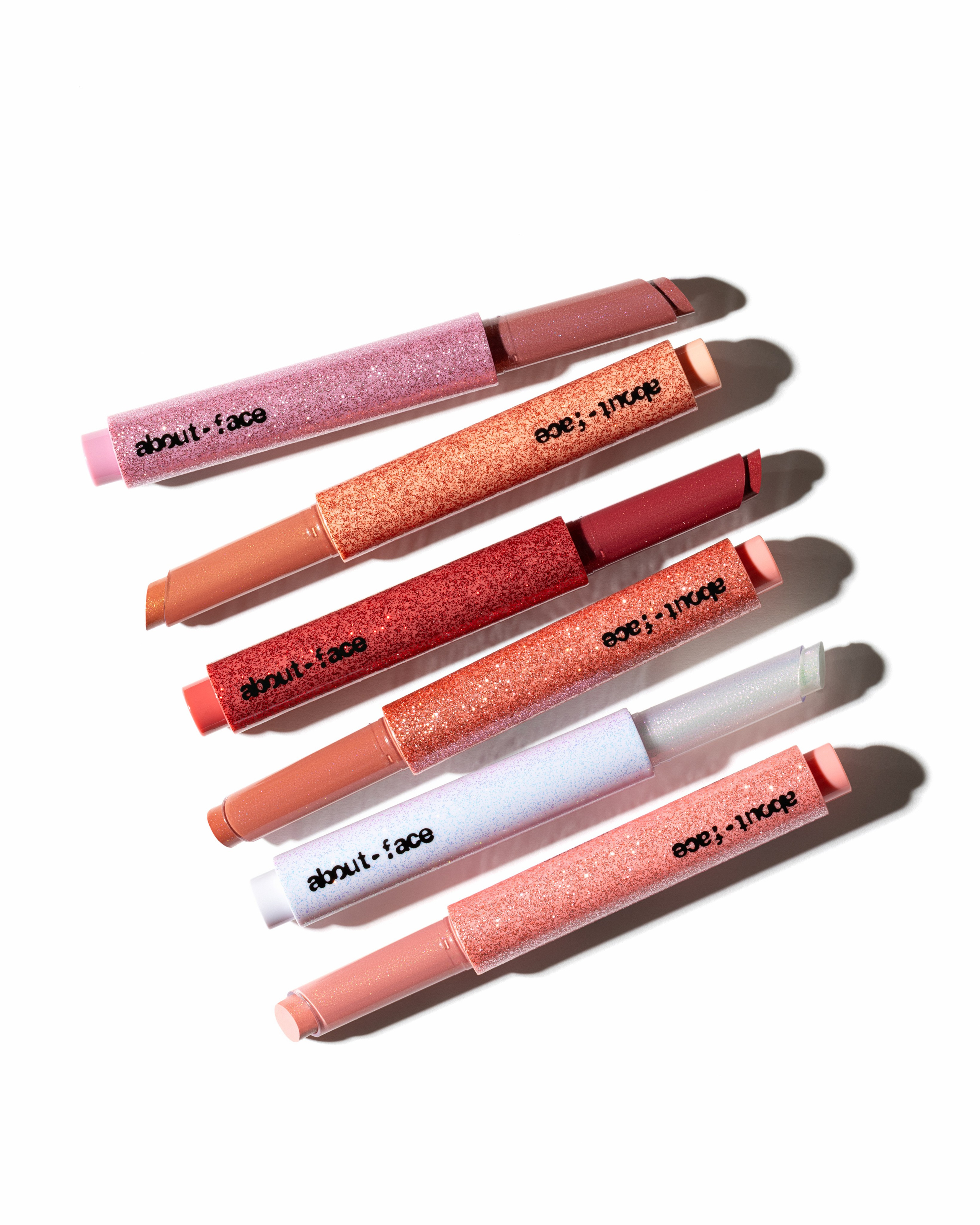 About Face shimmer sticks lipstick. Retouching, photo editing, portfolio retoucher