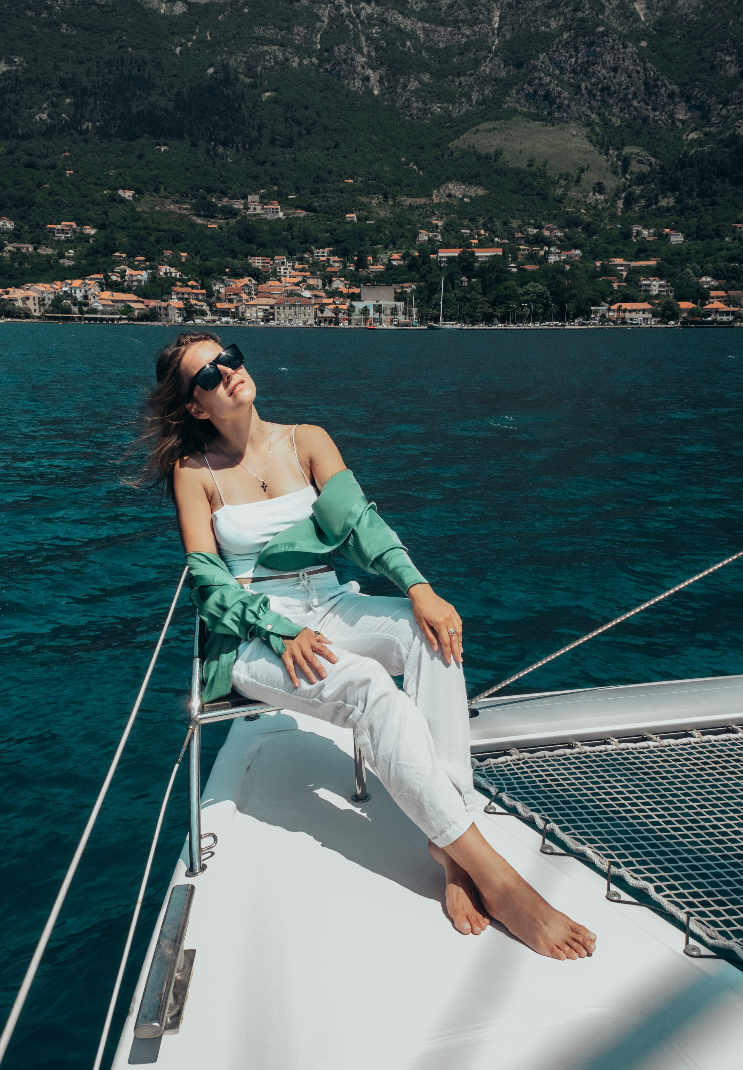 Boat tour with Anna, Roman and Tim. Portrait photographer in Tivat Montenegro Katerina Kirsanova