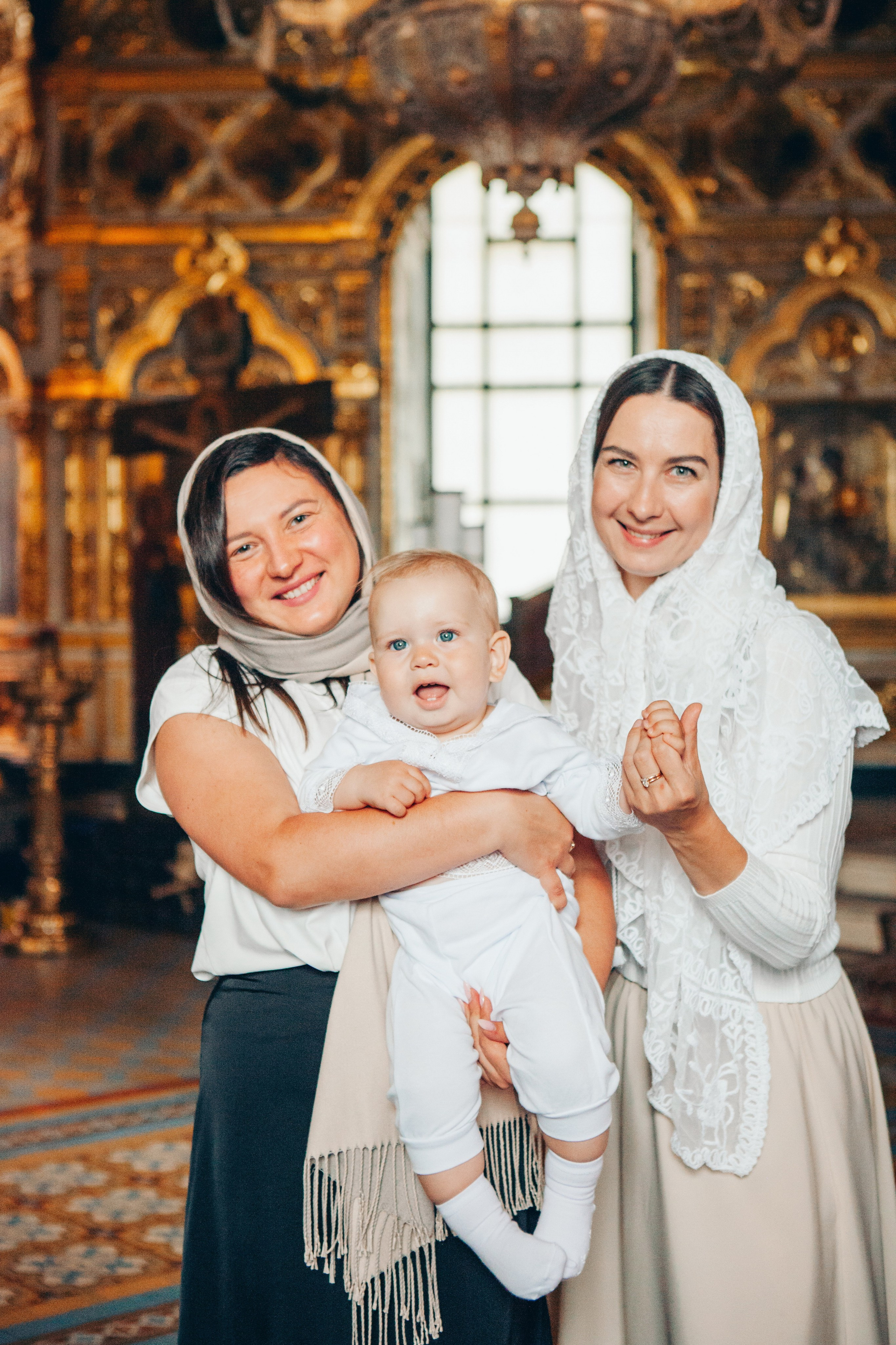 Крещение ребенка в церкви. Фотограф Ольга Ефремова