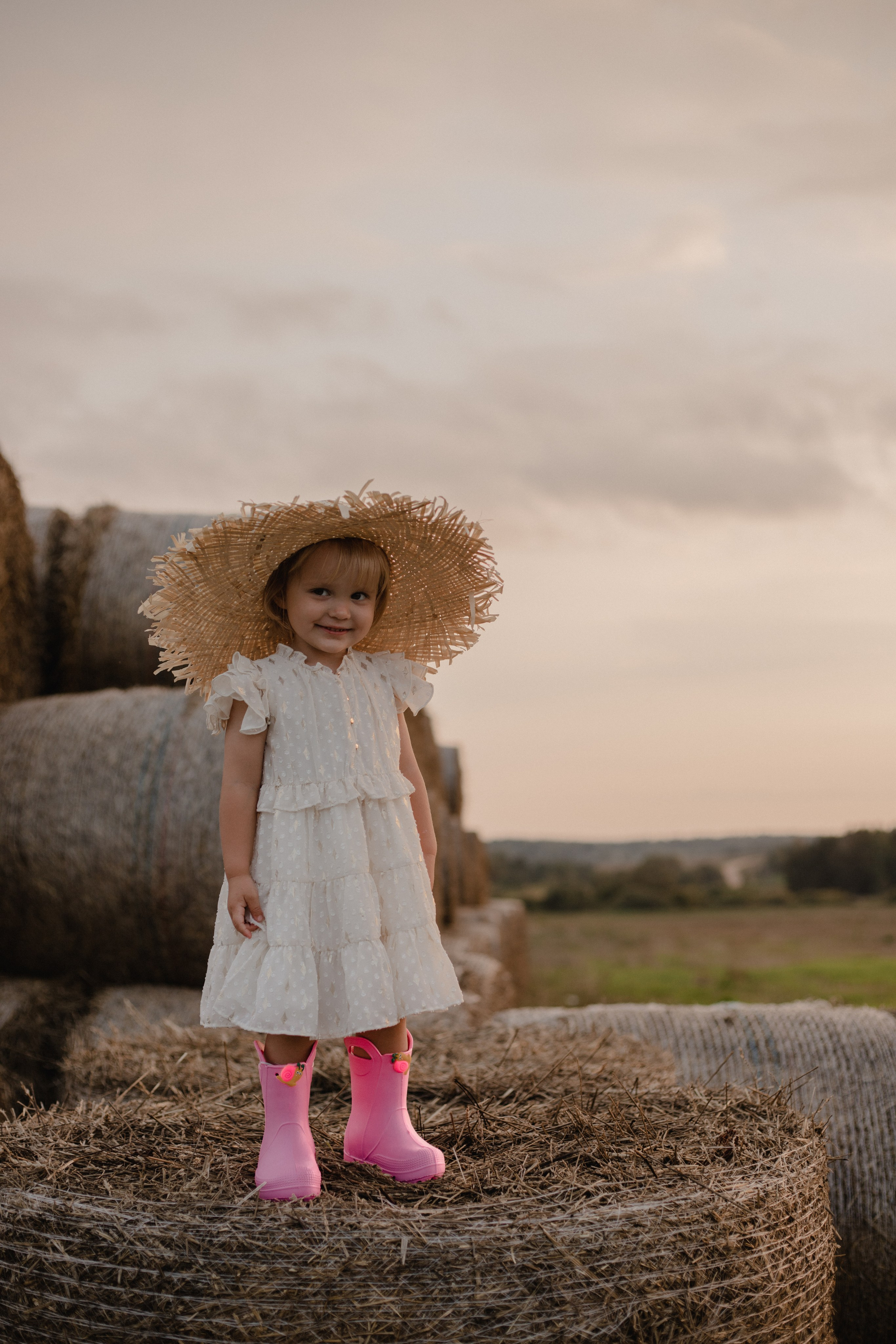 В стогах сена :)