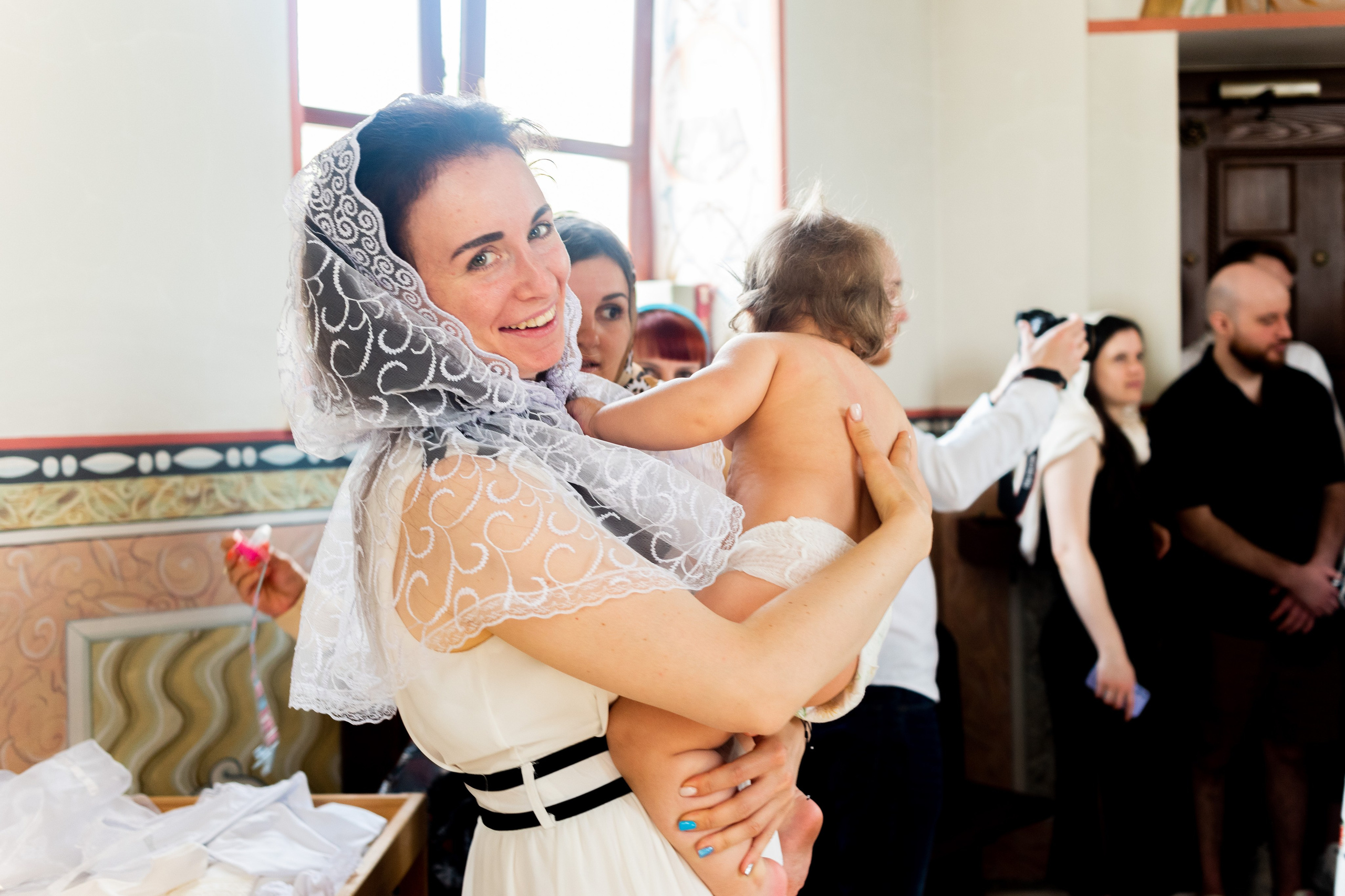 Крещение Ники. Фотограф Юлия Попова