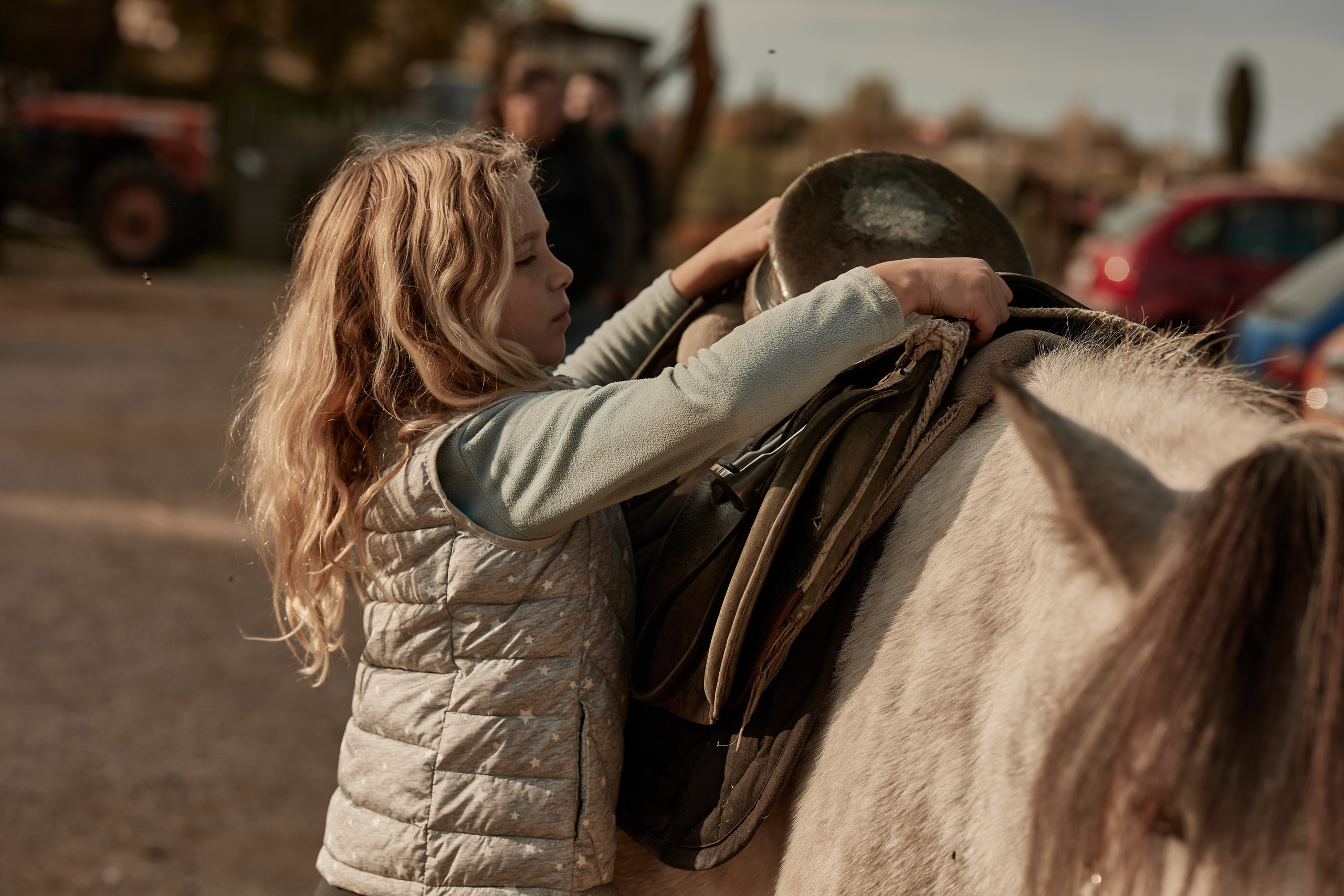 Reportage di bambini e pony. Fotografo di famiglie e ritrattista in Italia (Toscana)