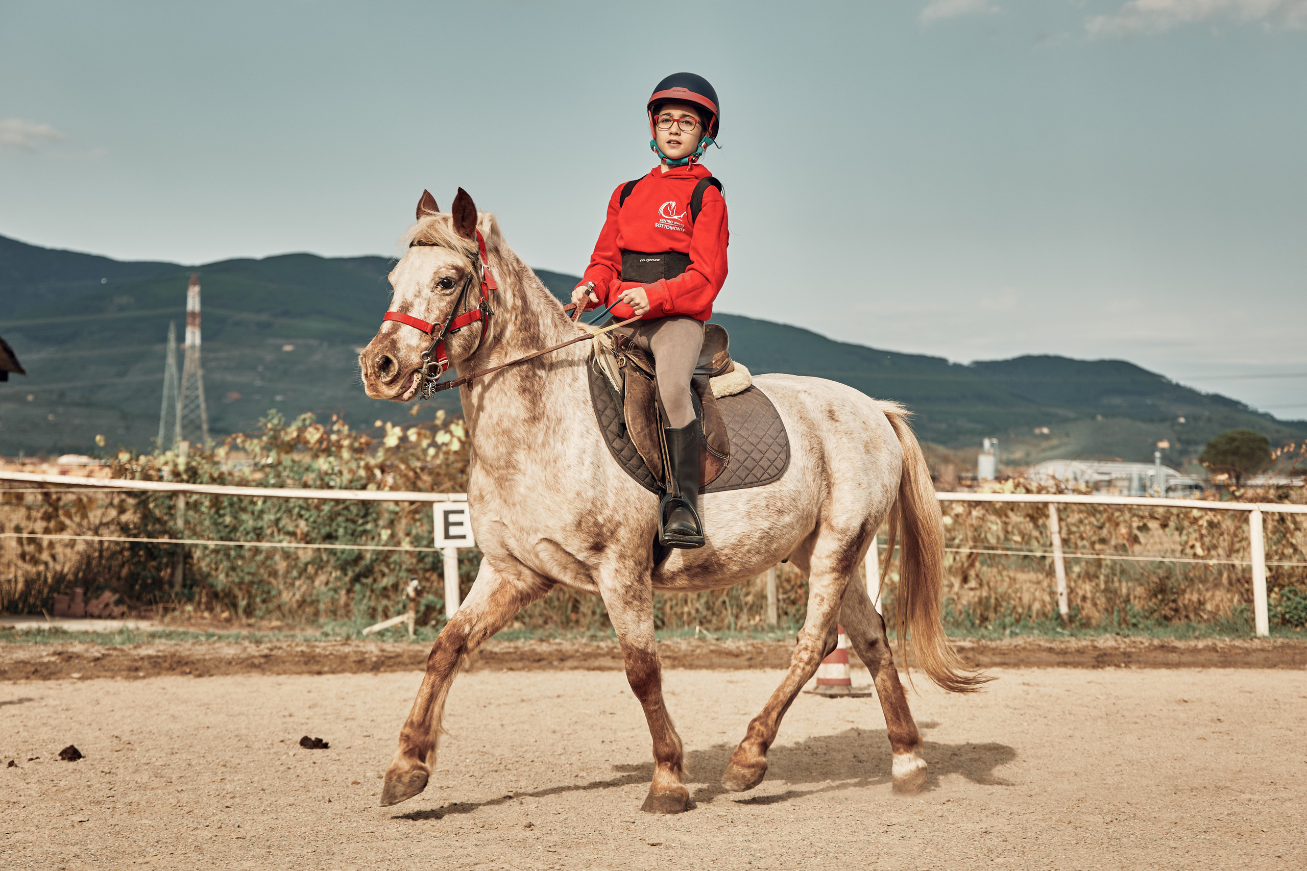 Reportage di bambini e pony. Fotografo di famiglie e ritrattista in Italia (Toscana)