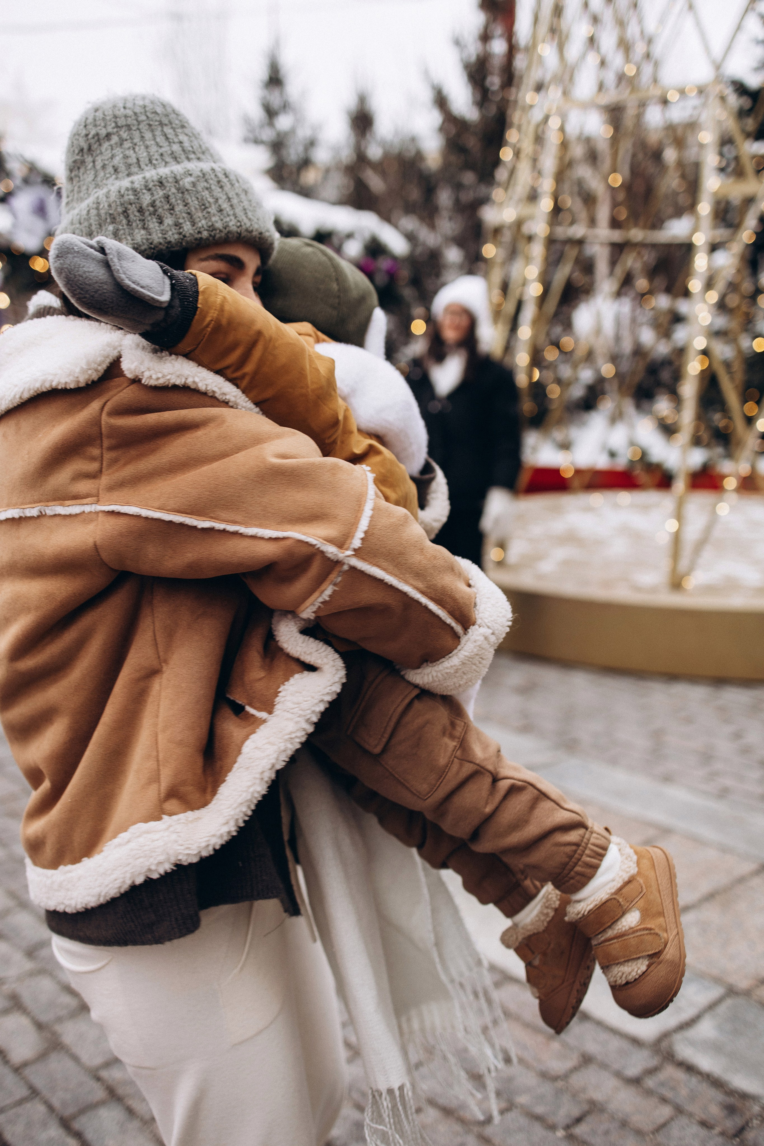 Марьям, Михаил и Лев на Рождественской ярмарке. Семейный фотограф в Москве Марина Петра