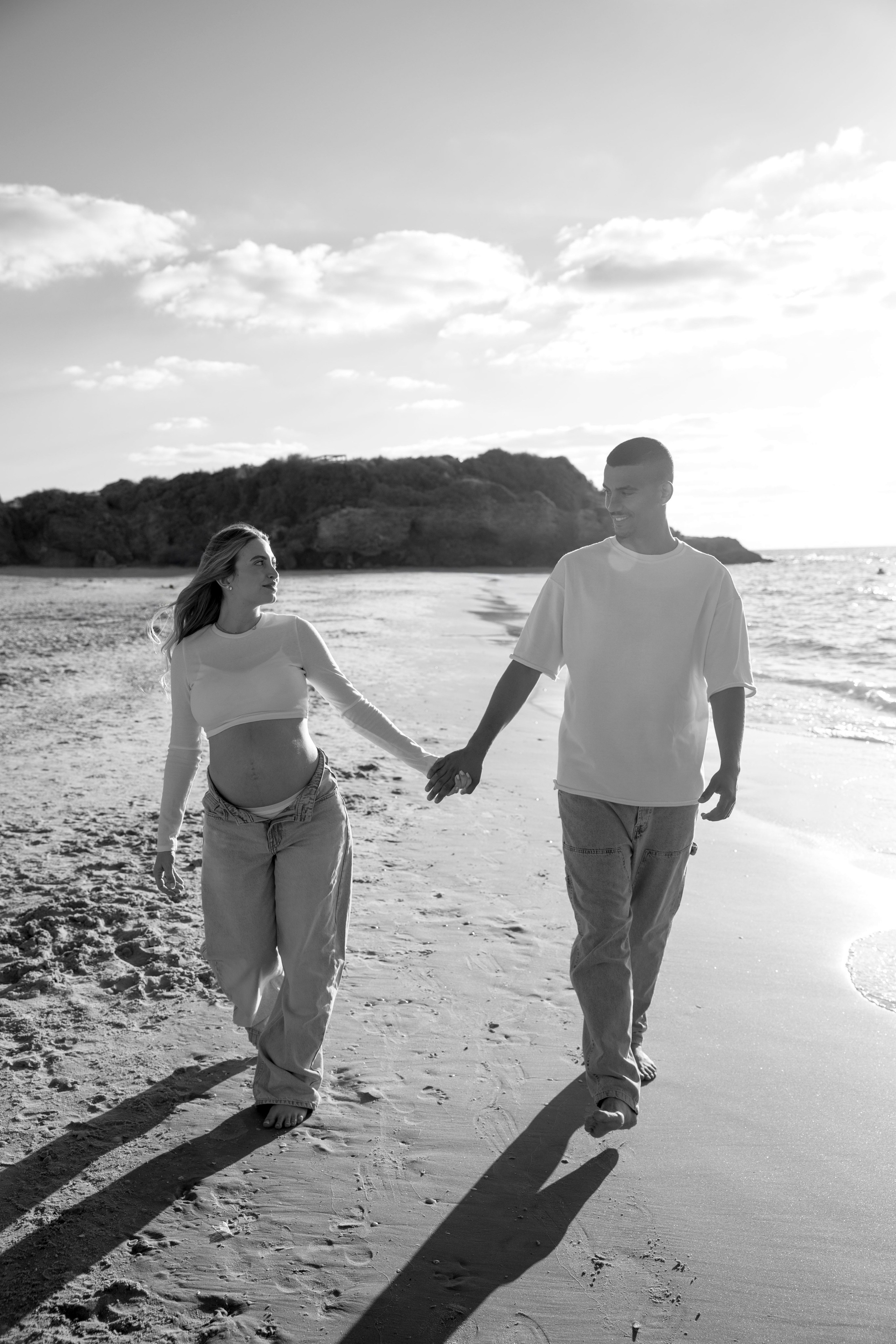 Pregnancy photoshoot near the sea. Wedding and family photographer