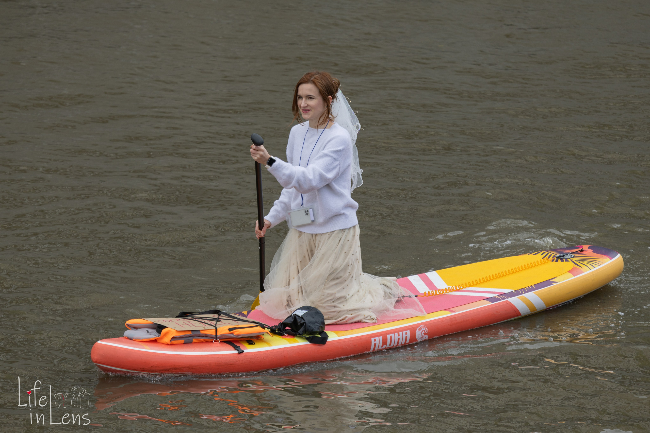 SUP-карнавал. Фотограф, получающий удовольствие от своей работы