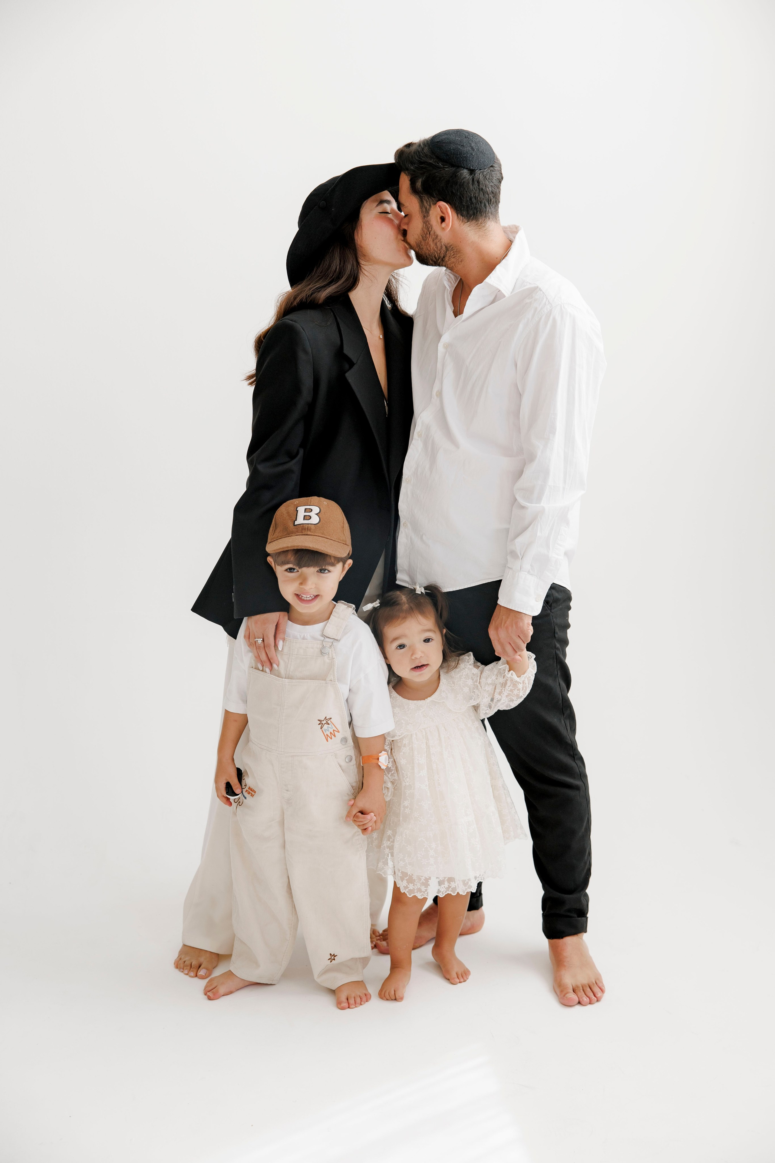 Family photoshoot inside the studio. Wedding and family photographer
