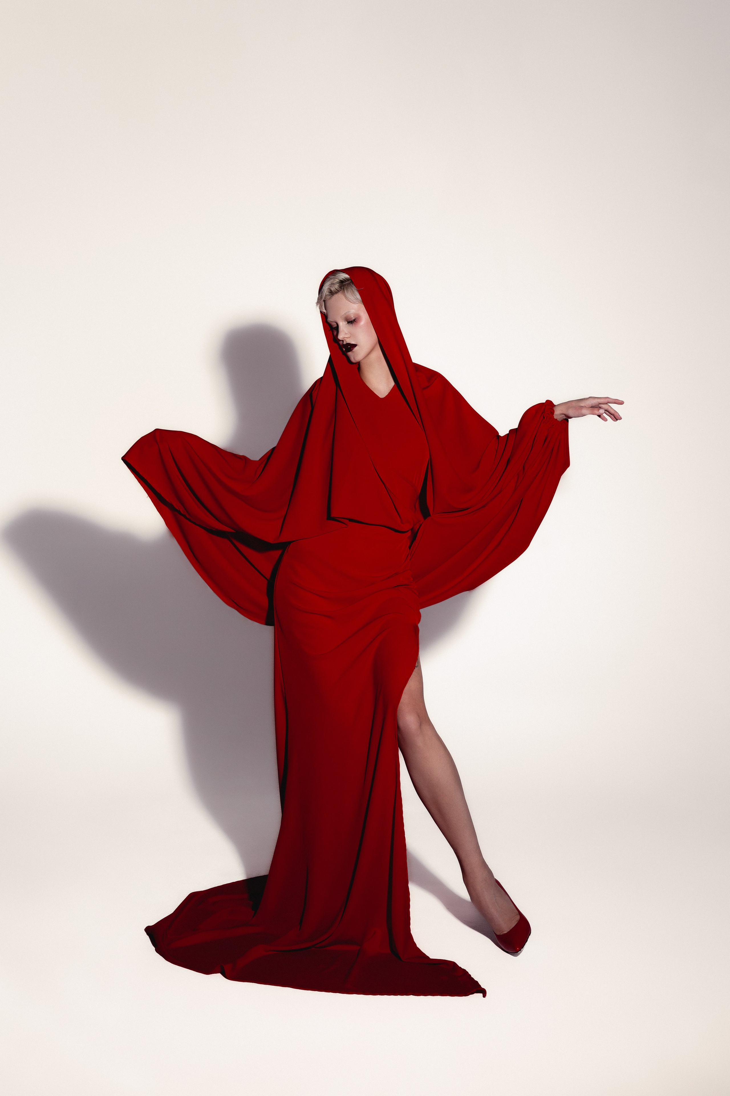 Red. Photographer. Producer. Retoucher