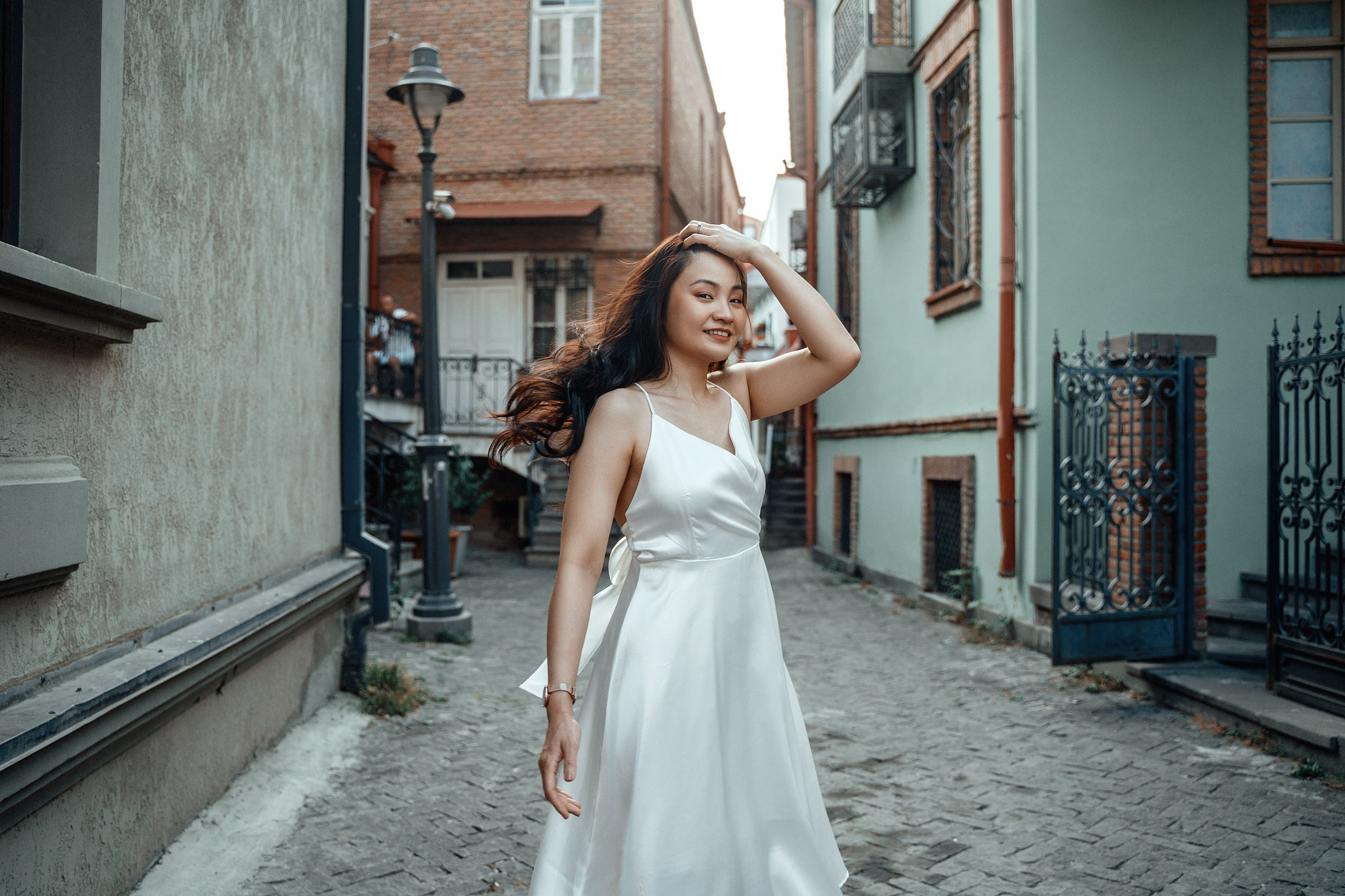 Alaeddine & Matika on the Peace Bridge in Tbilisi. Photographer Sergey Otkrytyi in Batumi & Tbilisi