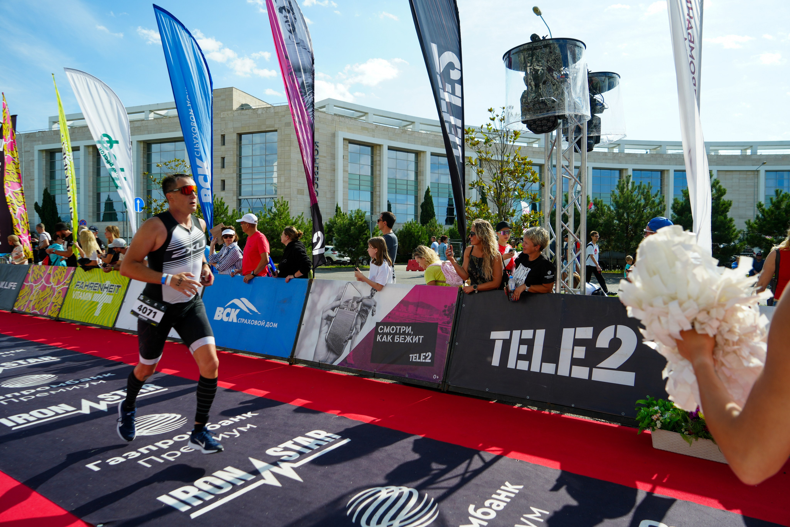 Фотоотчет партнерской интеграции для компании TELE2 на фестивале Ironstar. Репортажный фотограф в Красной Поляне и Сочи Павлюченко Екатерина