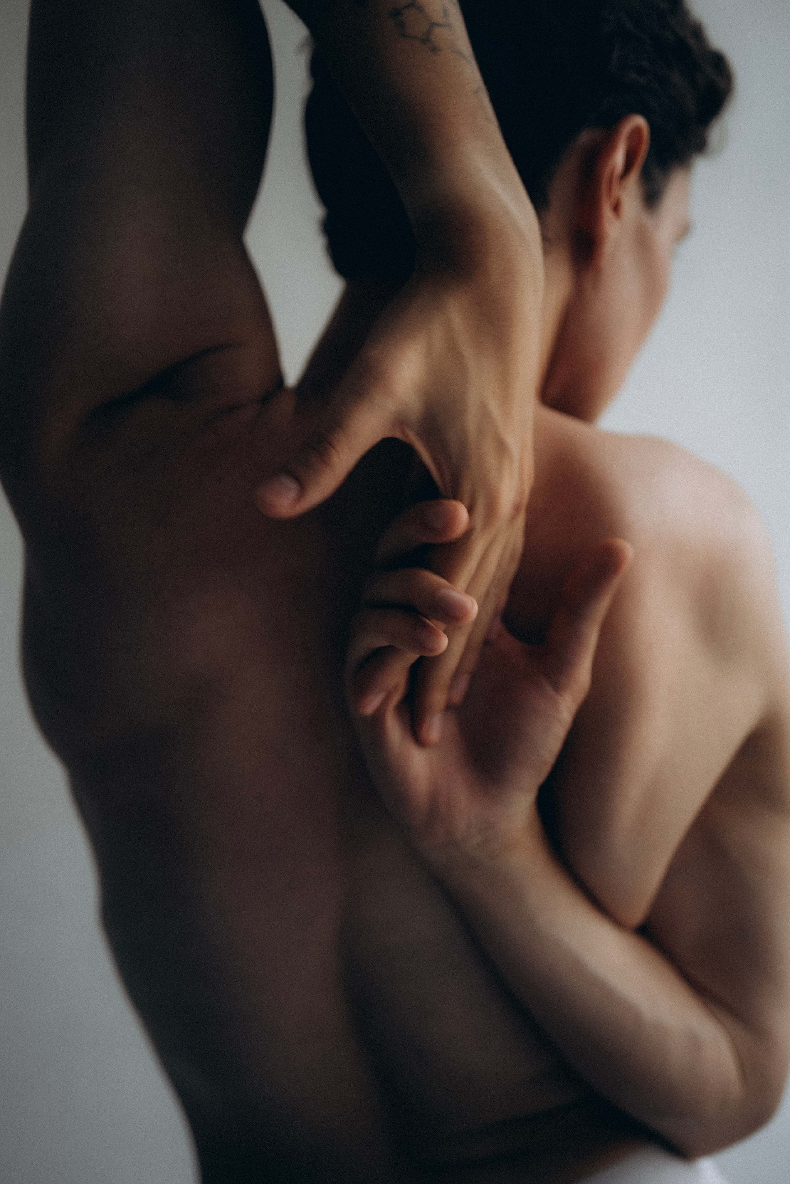 Abstract portrait of a man framed by fabric in Barcelona black and white photography