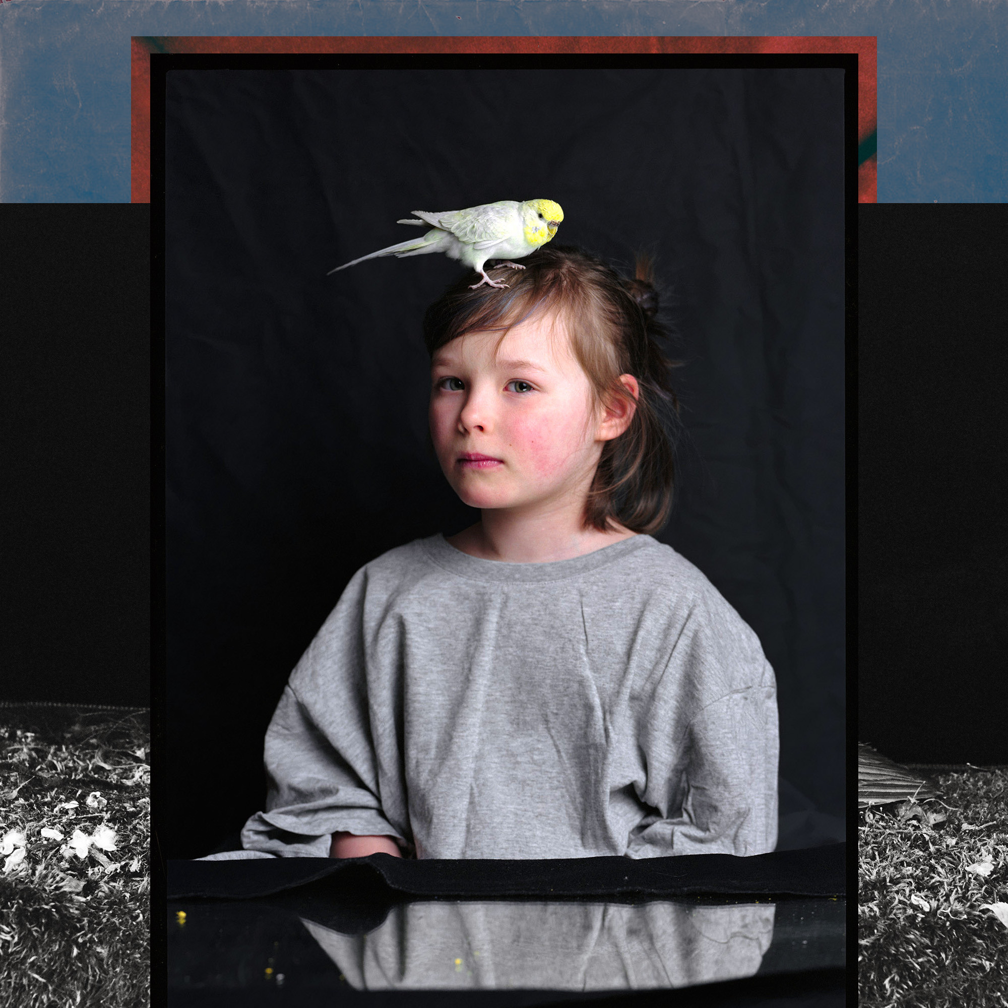 Maja with a parrot. From "Inner Chamber" project. 2021