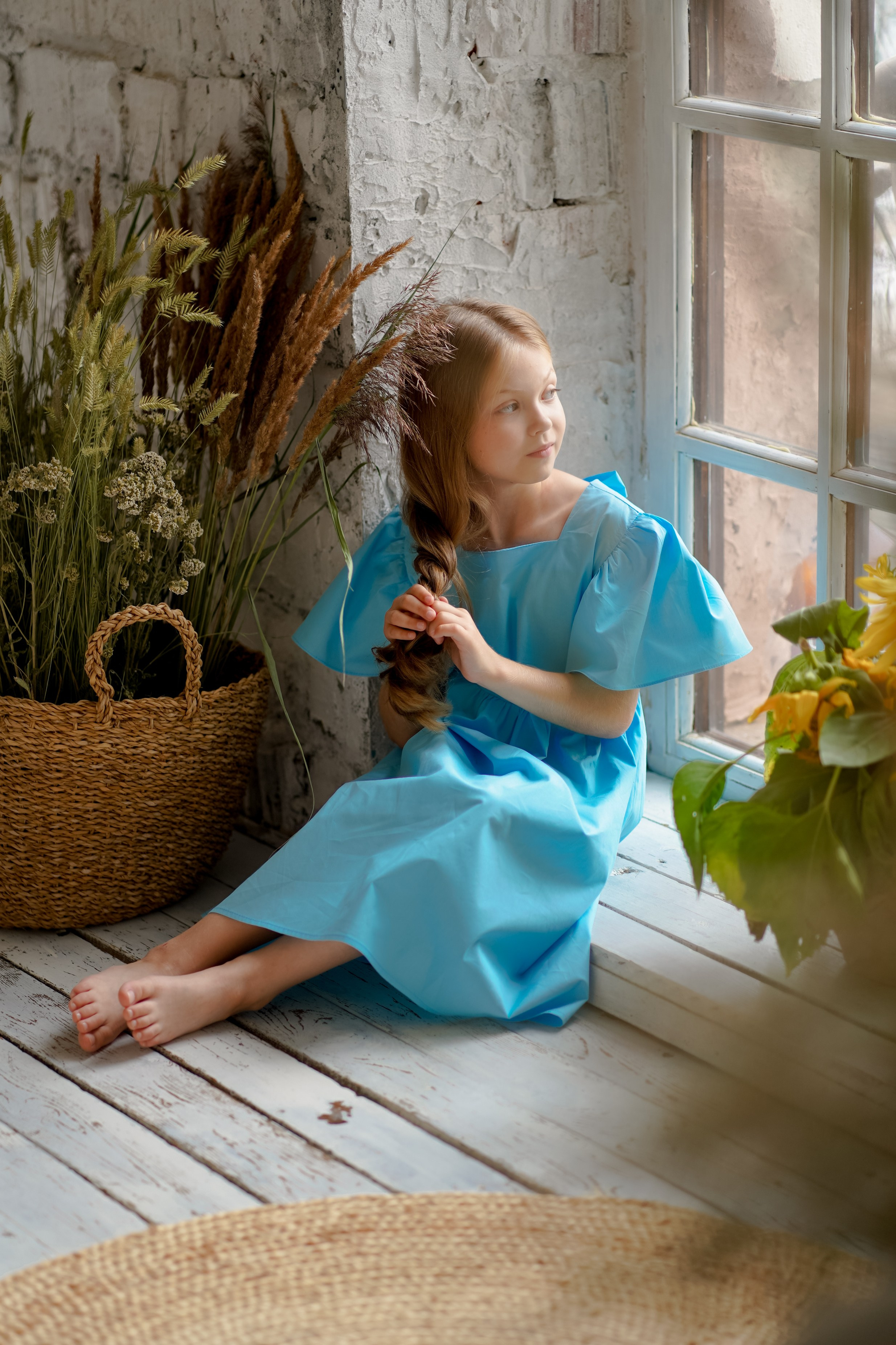 Кира с подсолнухами. Фотограф Татьяна Митрофанова