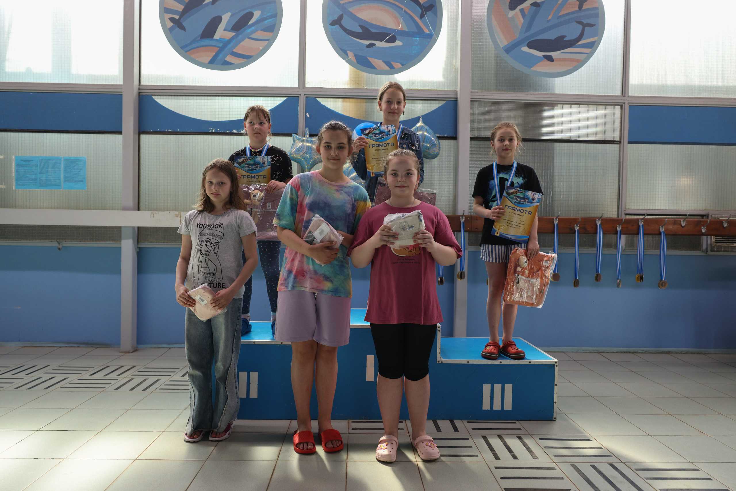 Веселый дельфин. Плавание. Дети 8-9 лет. Фотограф Александр Заломаев