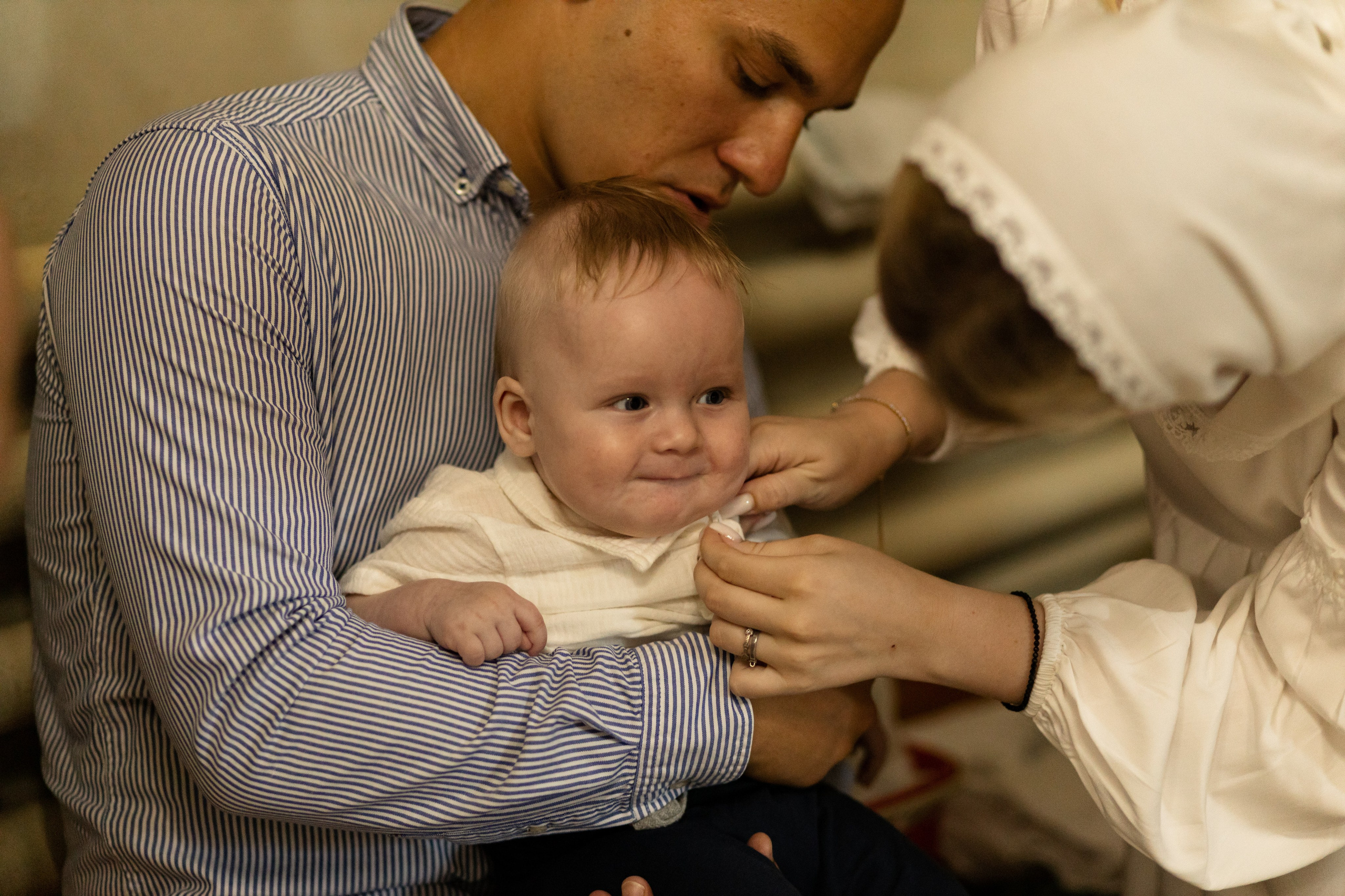 Таинство крещения Романа в Церкви Георгия Победоносца. Анастасия Безуглова- свадебный фотограф в Таганроге