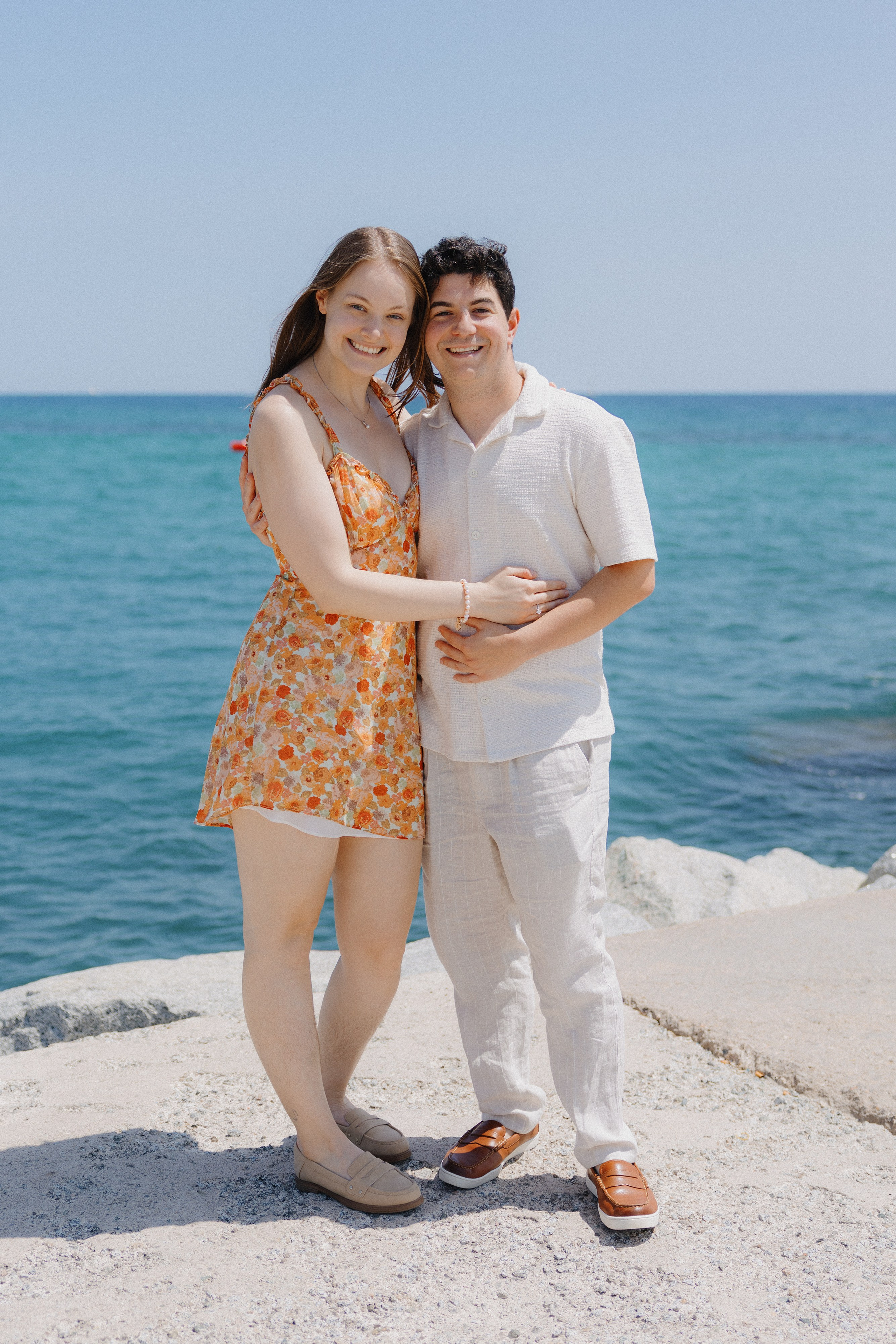 Joyful couple celebrating their engagement in Spain