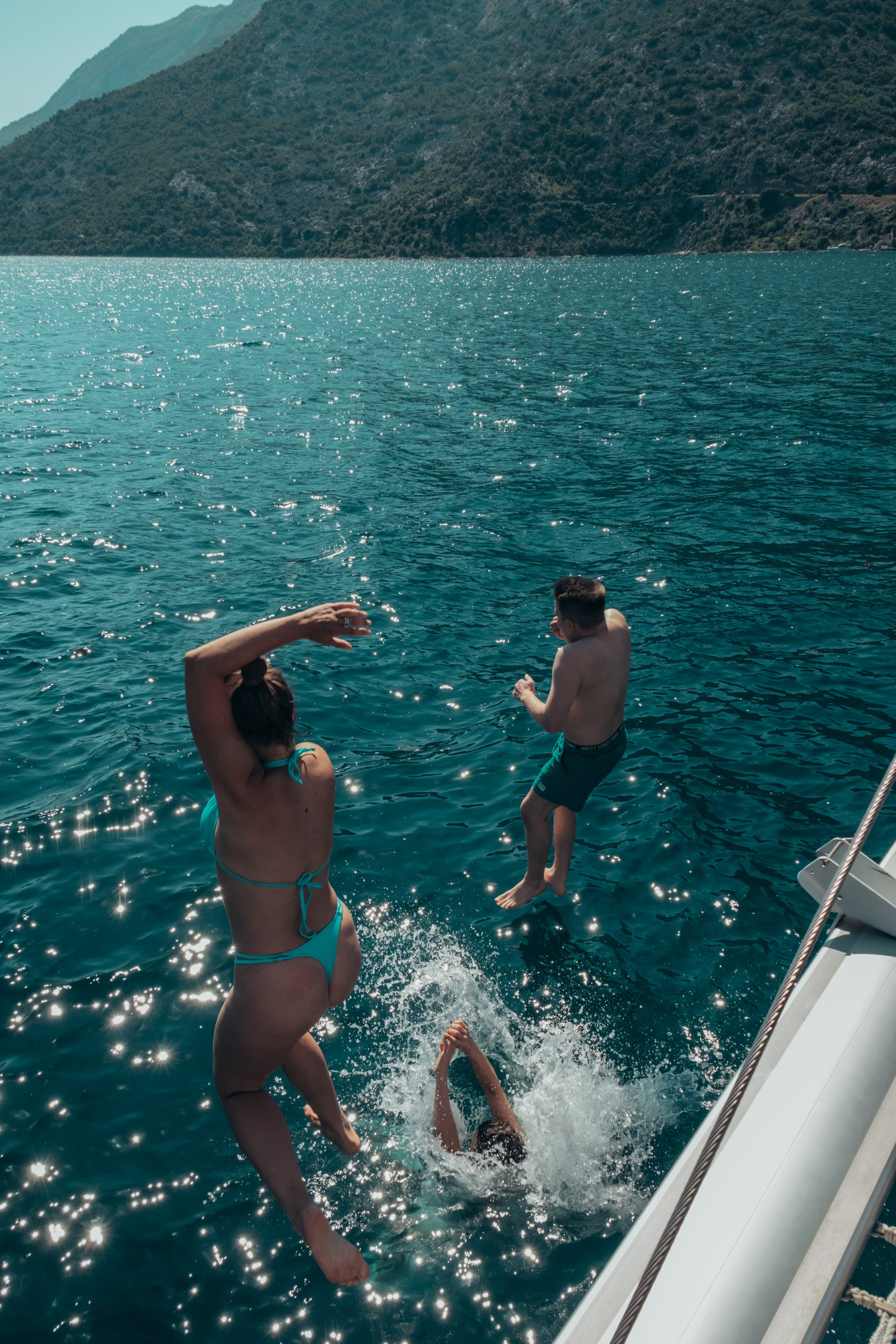 Boat tour with Anna, Roman and Tim. Portrait photographer in Tivat Montenegro Katerina Kirsanova