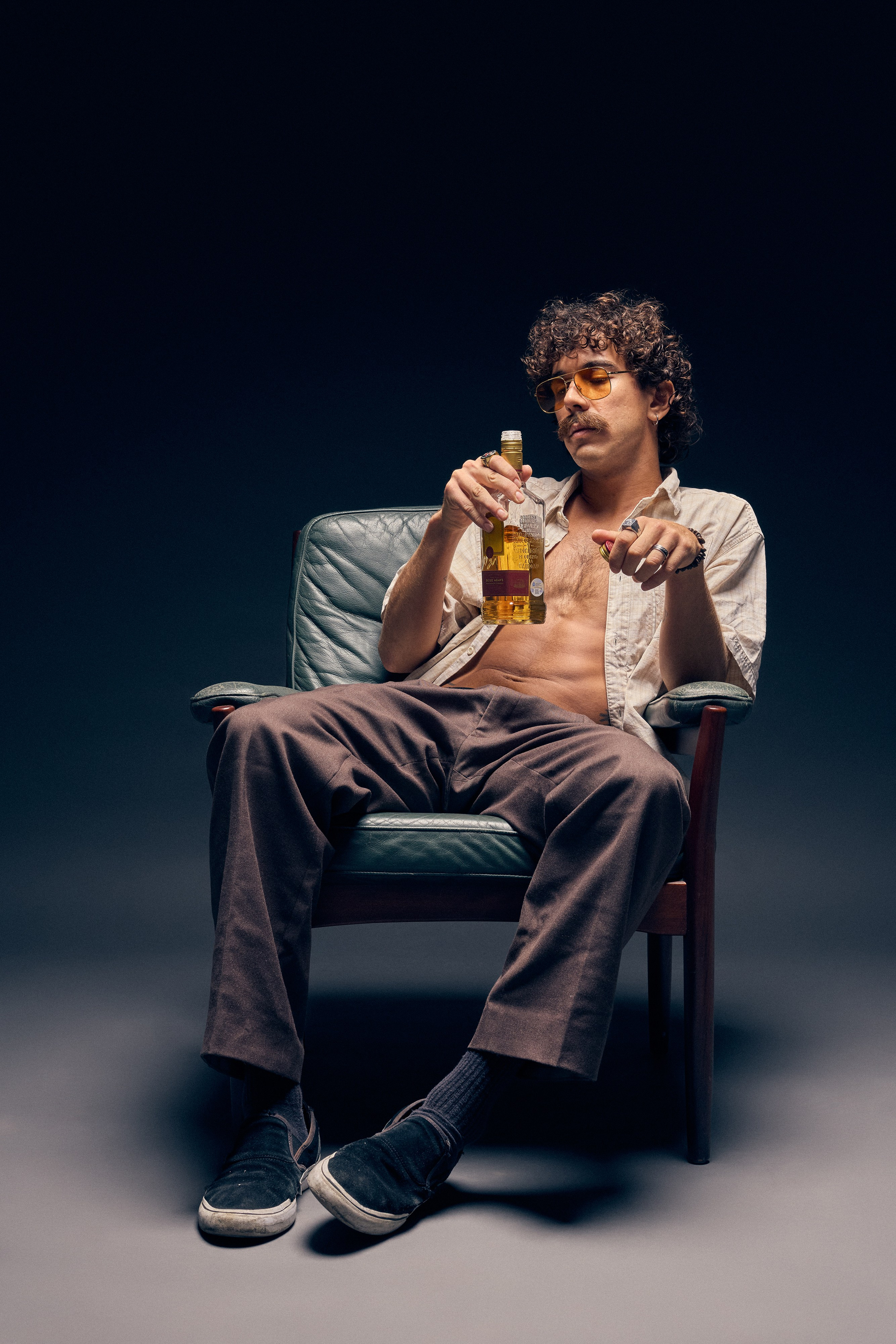 Escobar era inspired fashion portrait with dramatic studio lighting