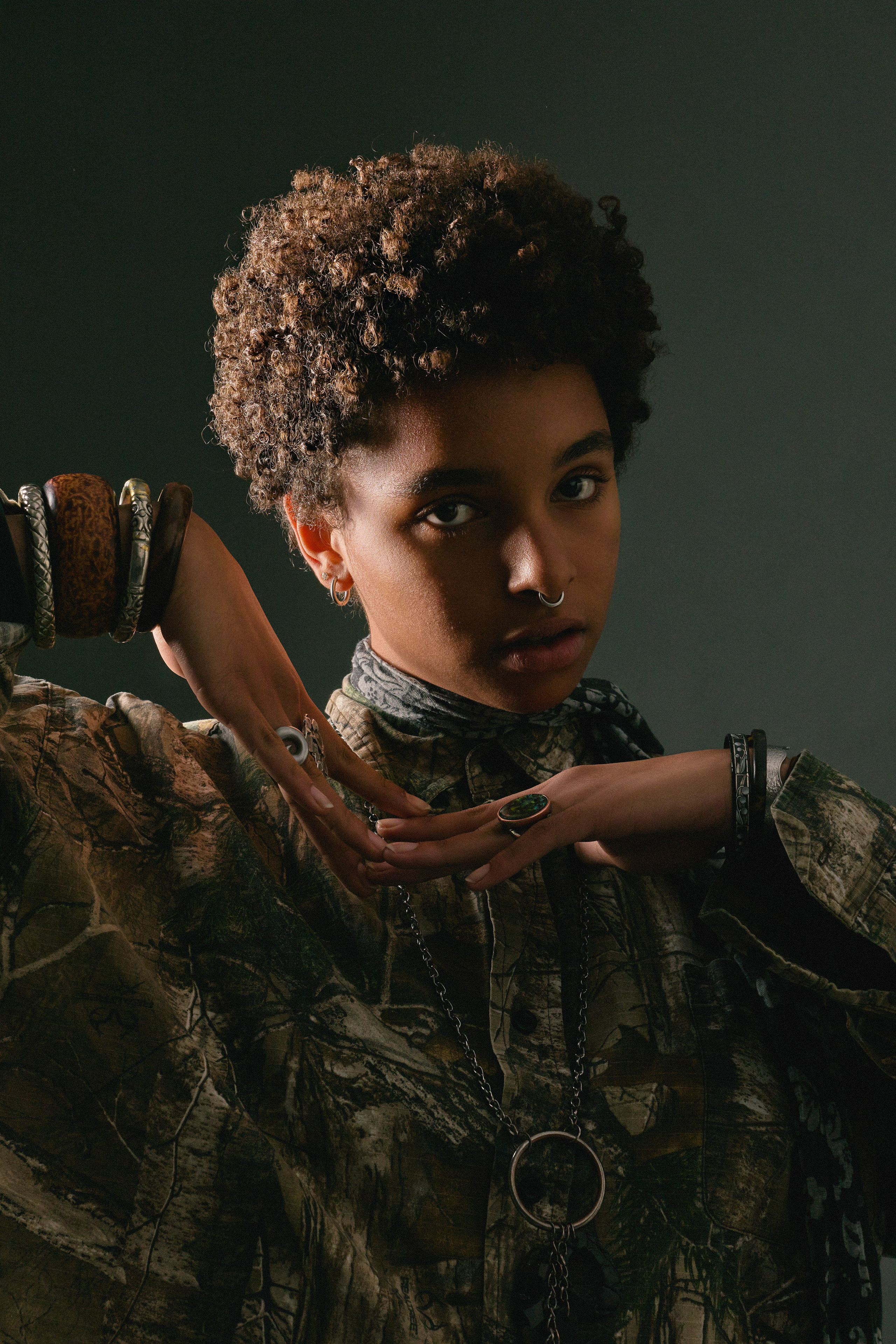 Fashion-inspired studio portrait of a woman with modern styling