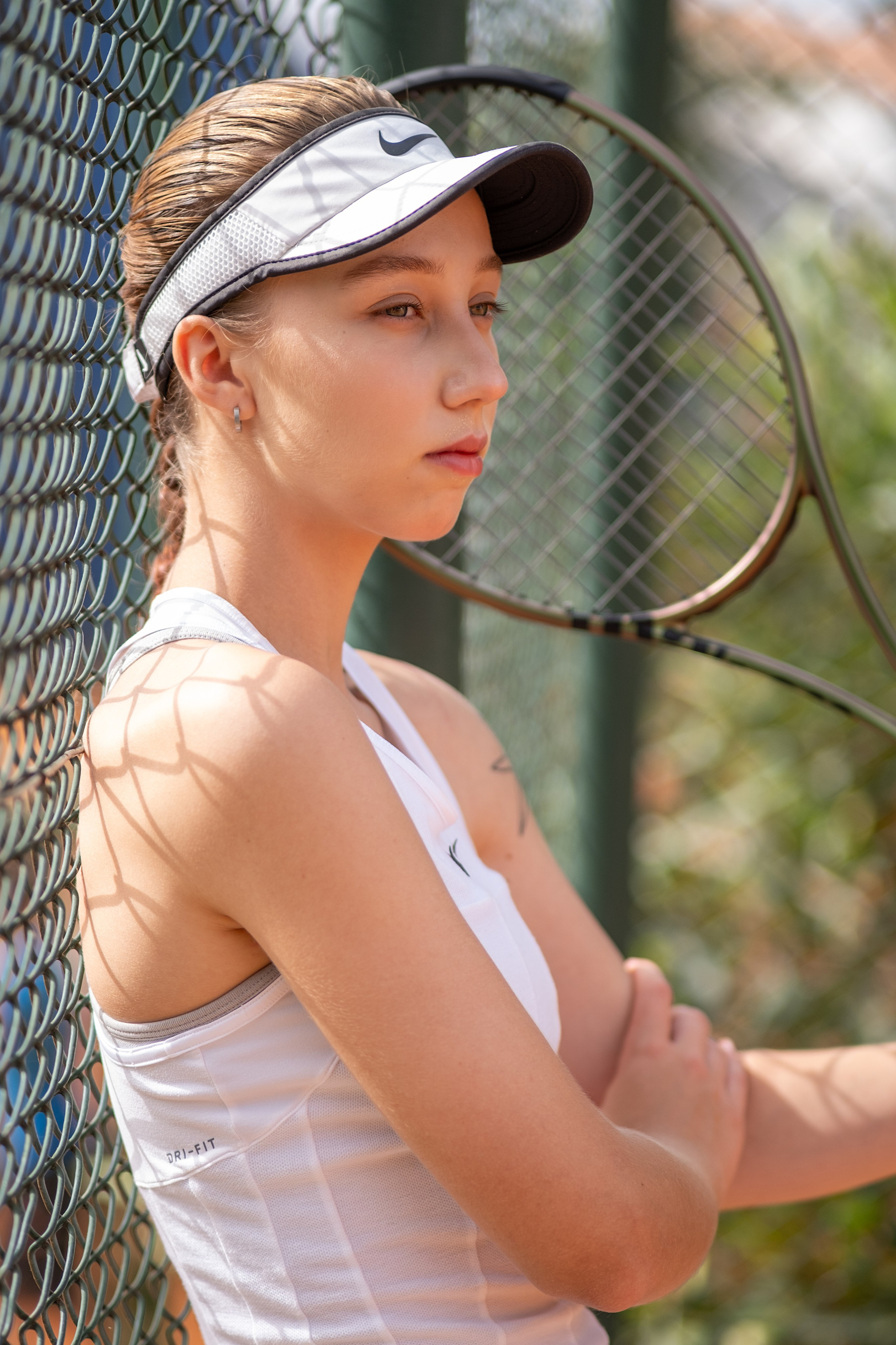 On the tennis court. Family and wedding photographer in Montenegro