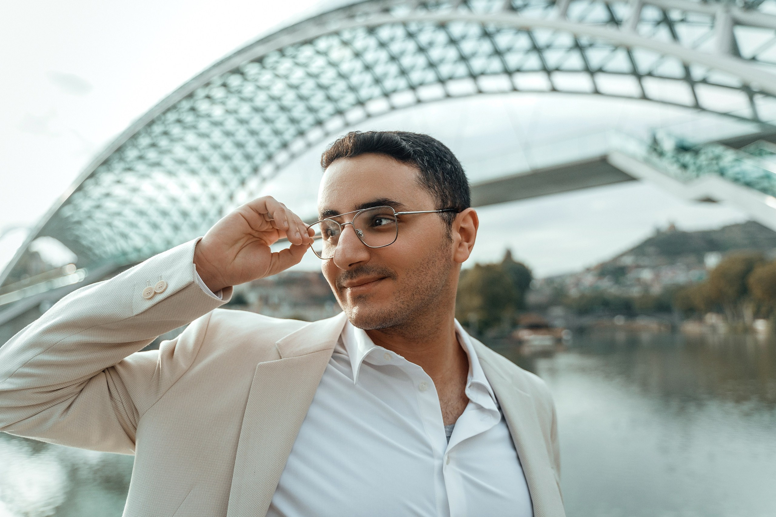 Alaeddine & Matika on the Peace Bridge in Tbilisi. Photographer Sergey Otkrytyi in Batumi & Tbilisi