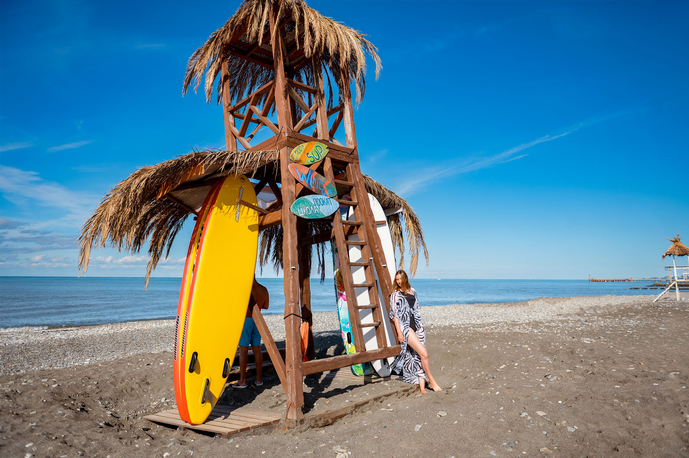 Пляж Мандарин фотография девушки у сапов