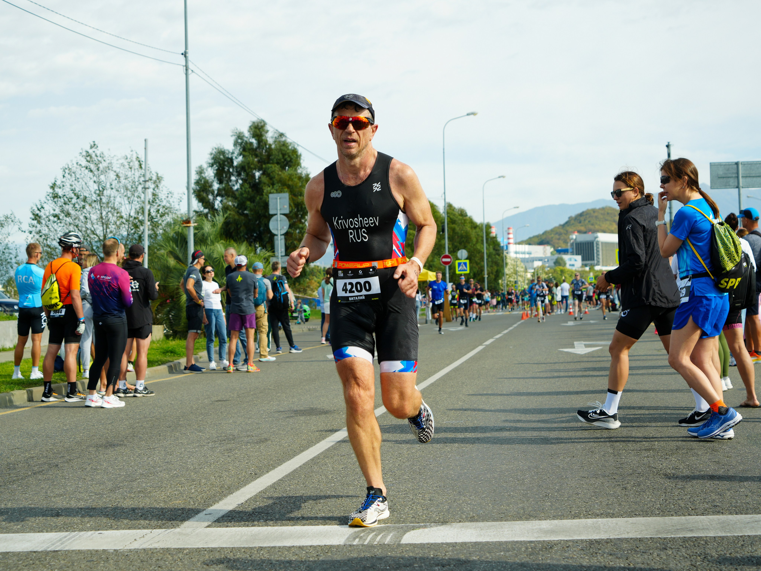 Фотоотчет партнерской интеграции для компании TELE2 на фестивале Ironstar. Репортажный фотограф в Красной Поляне и Сочи Павлюченко Екатерина