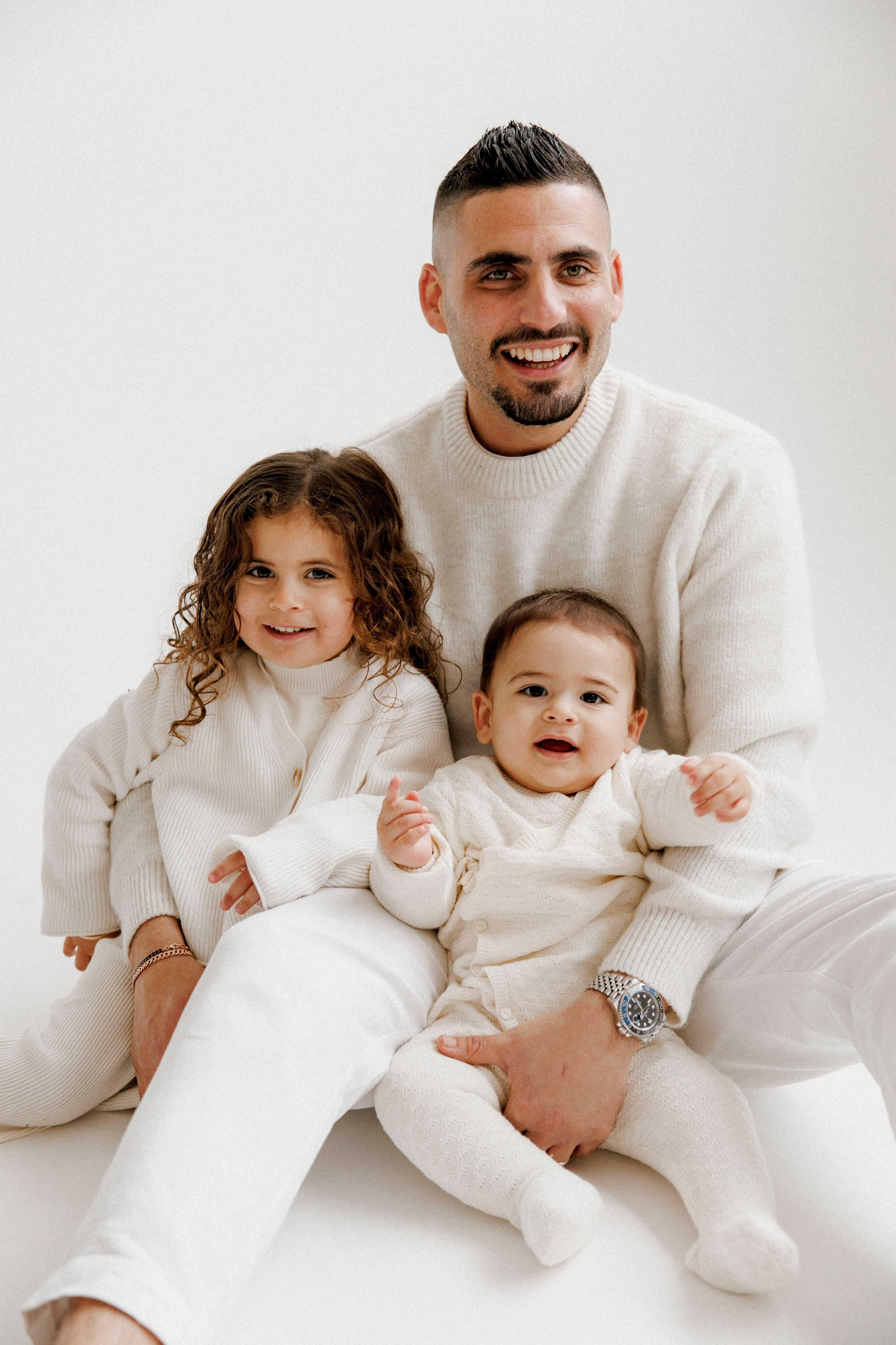 Family photoshoot in White Studio. Wedding and family photographer