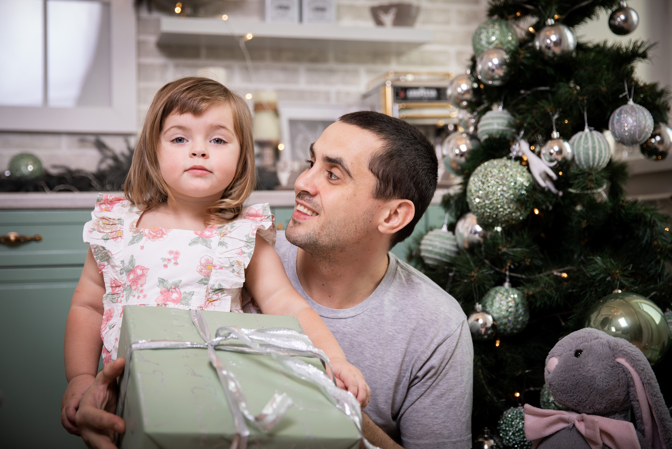 Father and daughter at a family photo shoot in the studio