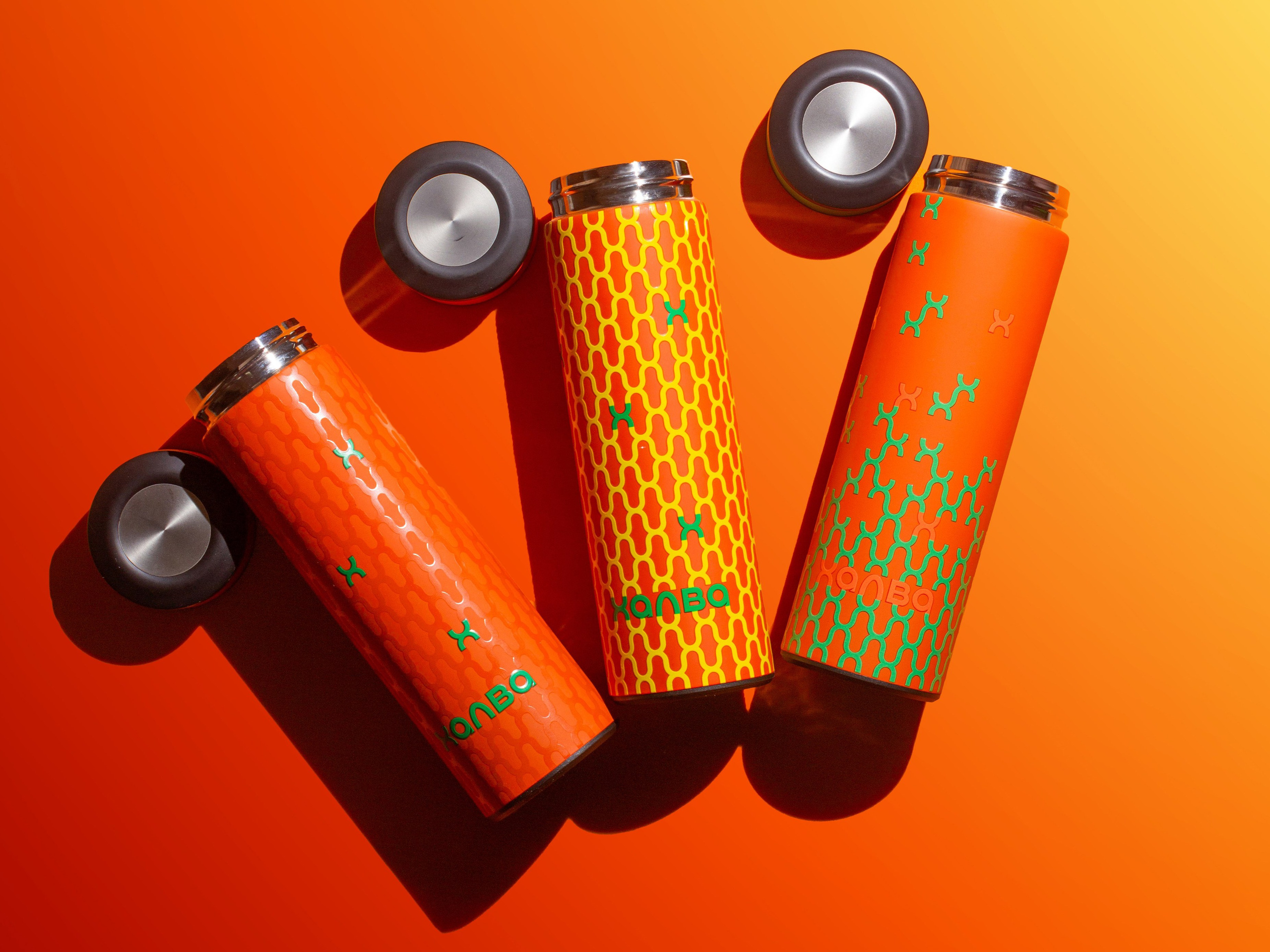Brand product photography Tbilisi — orange cosmetic tubes advertising shot