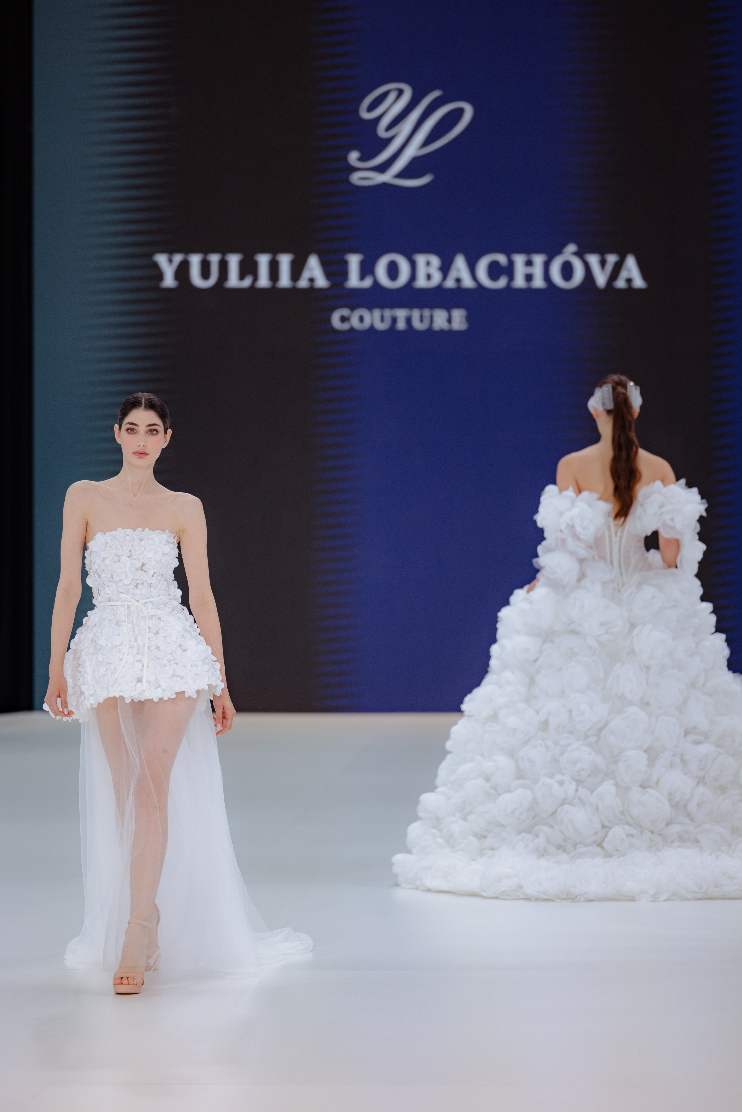 Interaction between model and stylist before live show