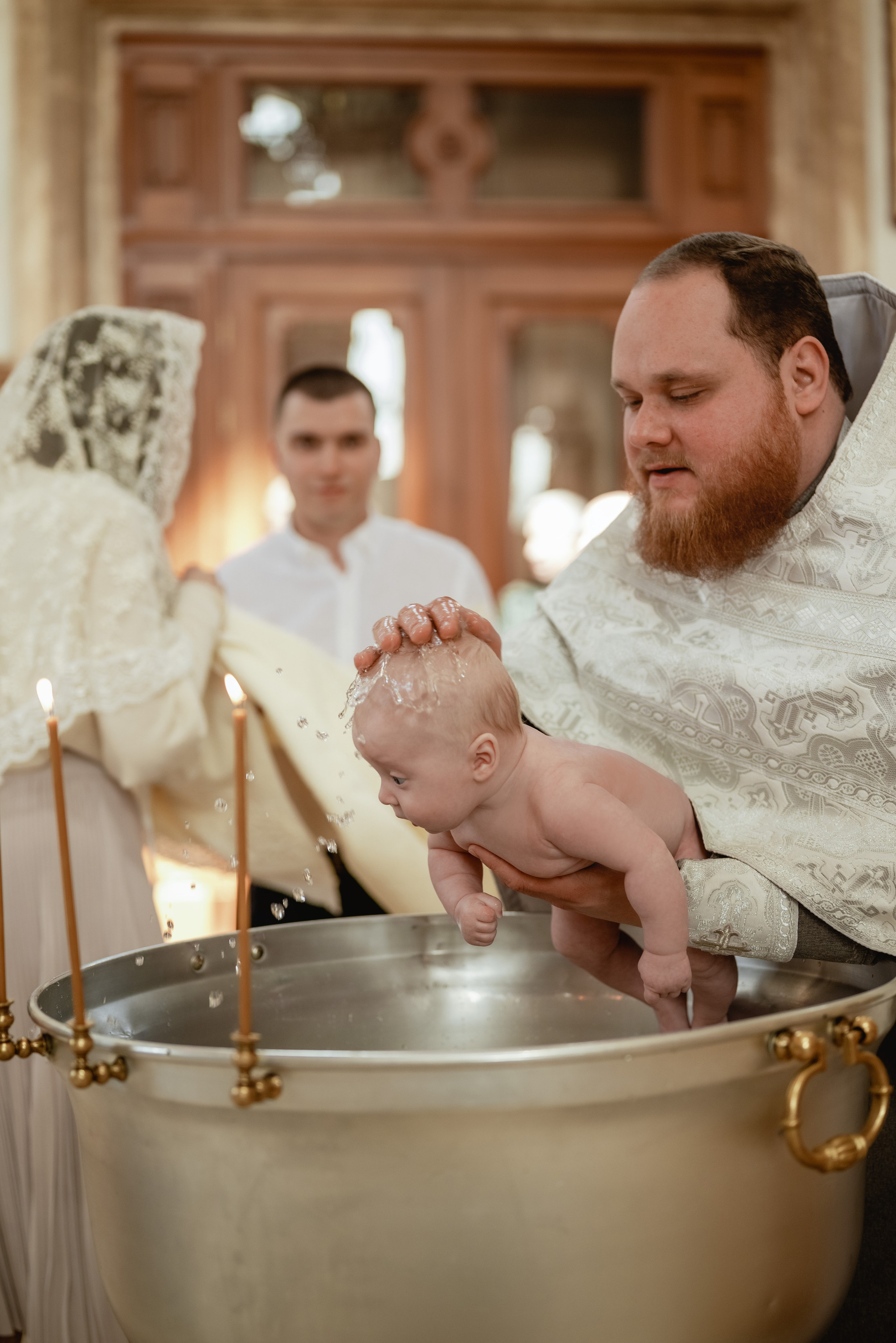 Крещение в храме Петра и Февронии. Юлия Басня семейный и свадебный фотограф в Донецке